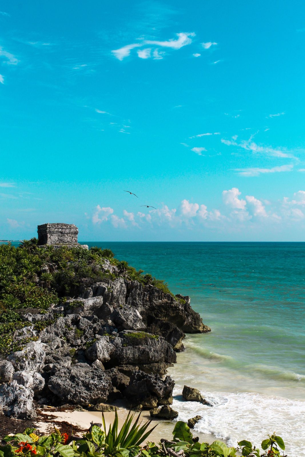 The Tulum ruins on their limestone cliff above the turquoise Caribbean