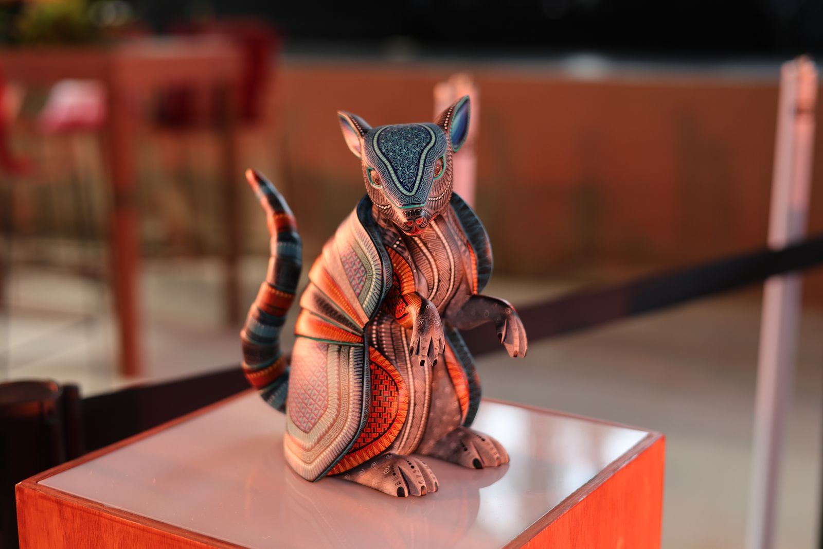 A hand-carved, hand-painted armadillo alebrije on display in Oaxaca A hand-carved, hand-painted armadillo alebrije on display in Oaxaca