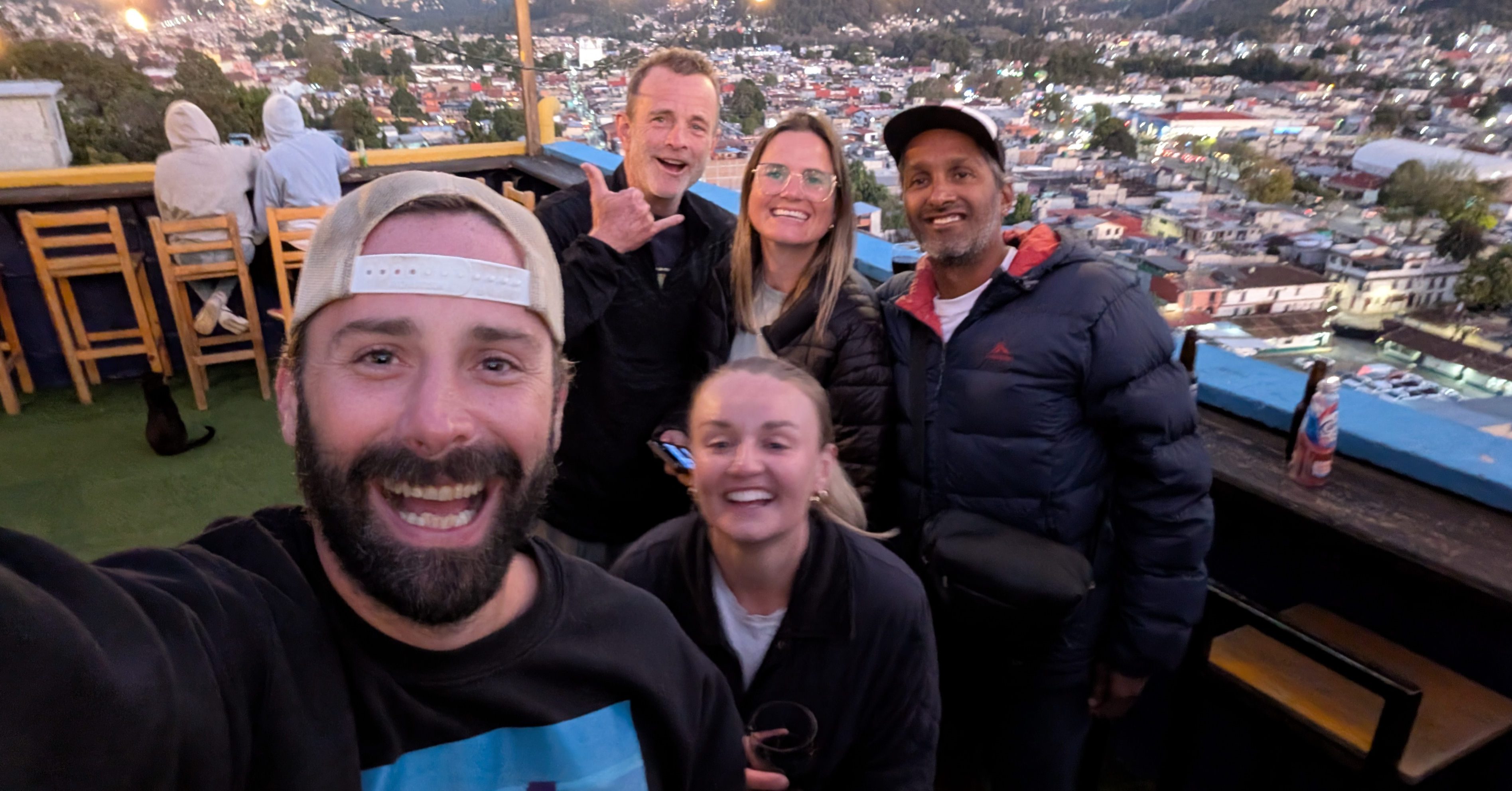 friends hanging out on a terrace at van gogh terraza in san cristobal de las casas chiapas