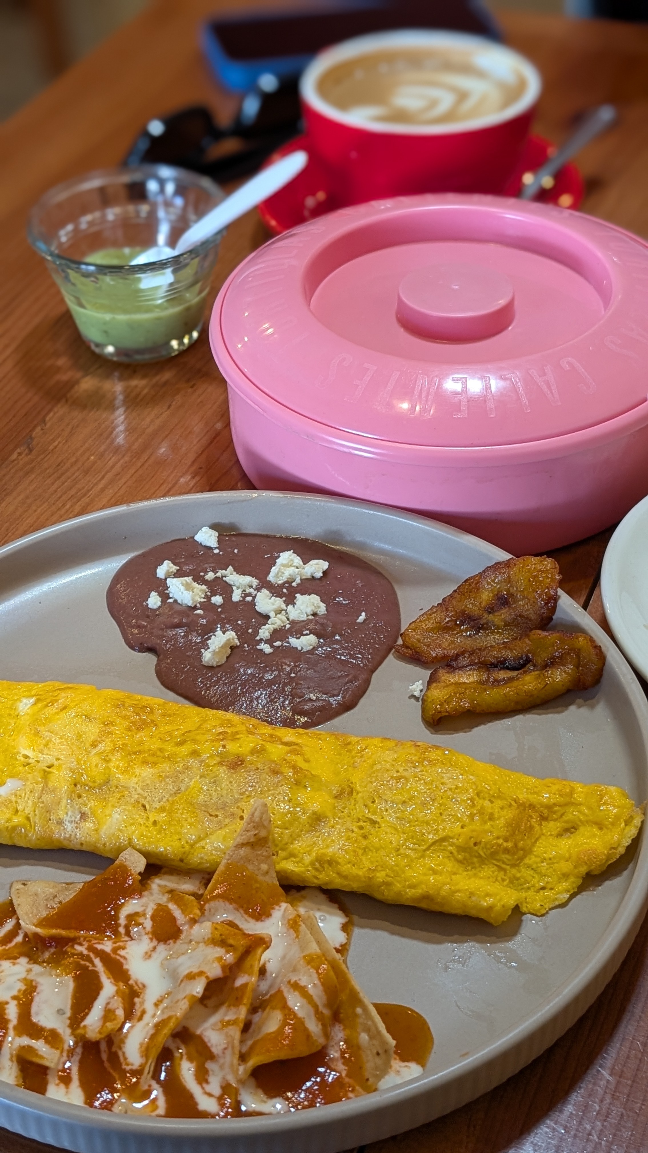 eating breakfast at el cafe caracol in barrio real de guadalupe in san cristobal de las casas, chiapas