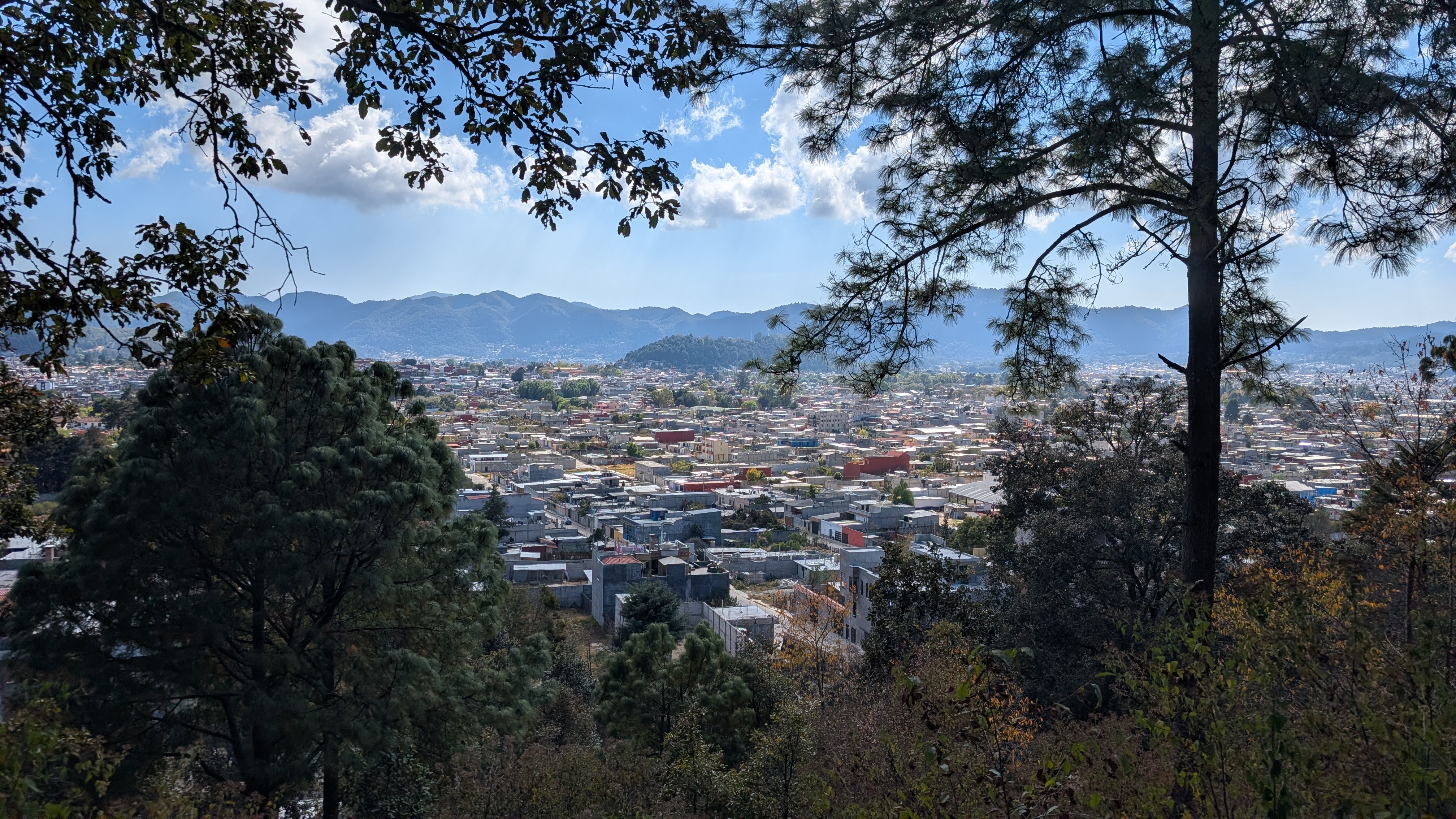 view of the city of san cristobal de las casas from a hike at the Reserva Ecológica y Jardín de Orquídeas Moxviquil