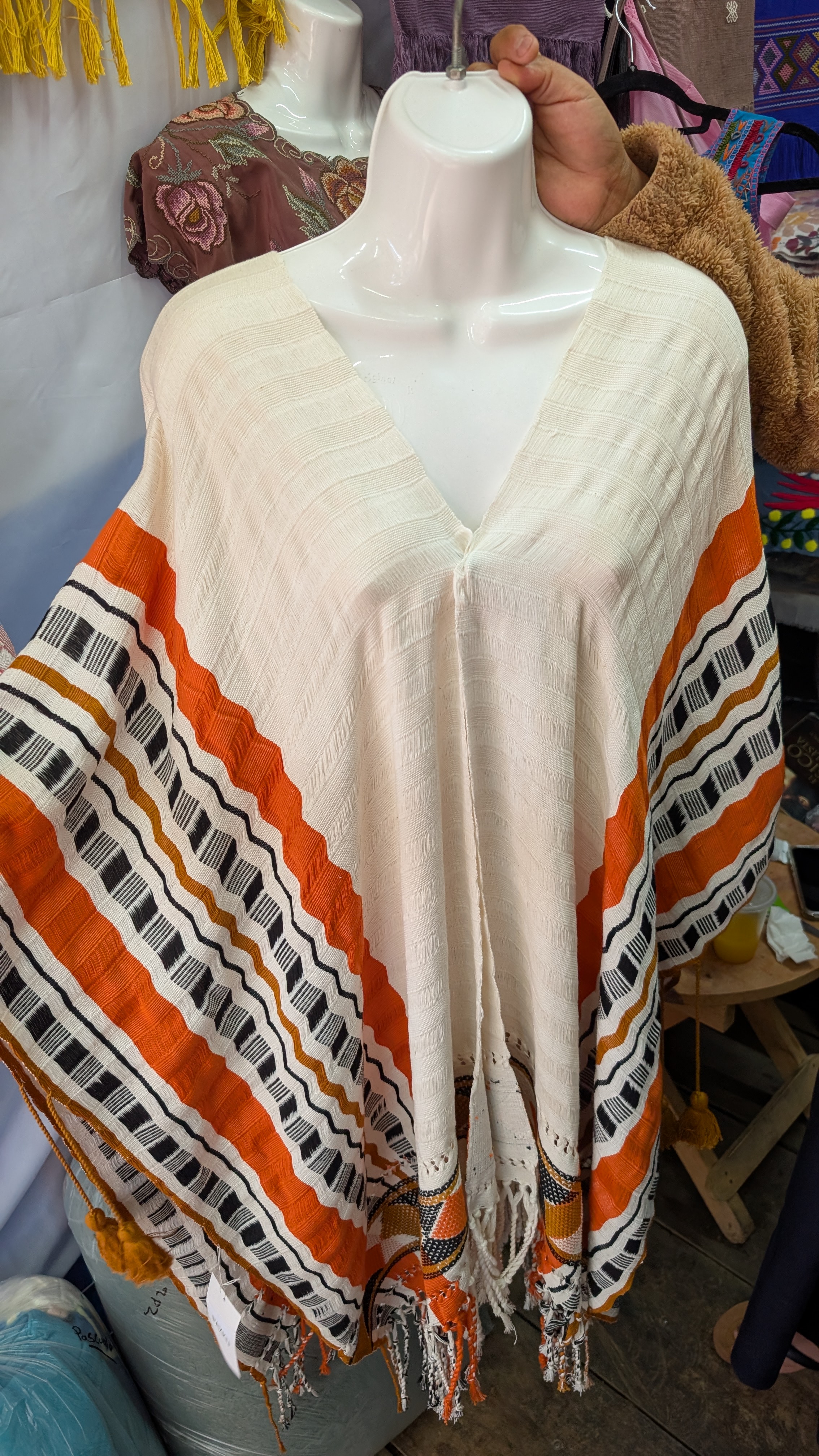 a piece of clothing that is hand woven by tzotzil community in san cristobal de las casas chiapas