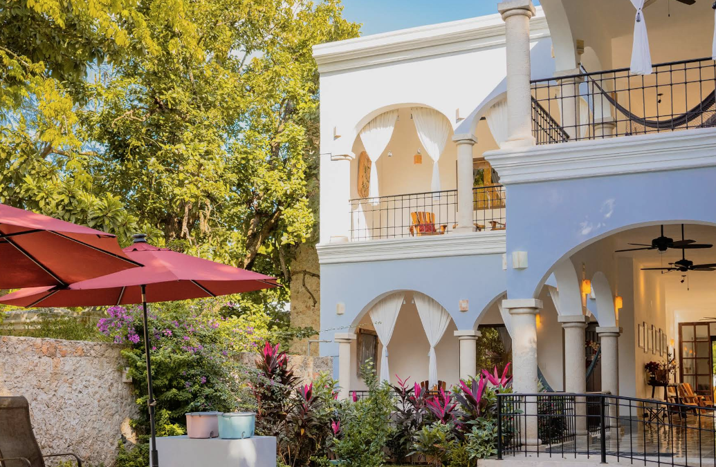 The patio with a pool and umbrellas at Hotel Posada San Juan in Valladolid Mexico The patio with a pool and umbrellas at Hotel Posada San Juan in Valladolid Mexico