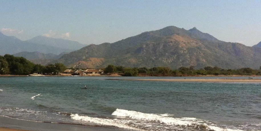 Beach on the coast of Chiapas with mountains in the background