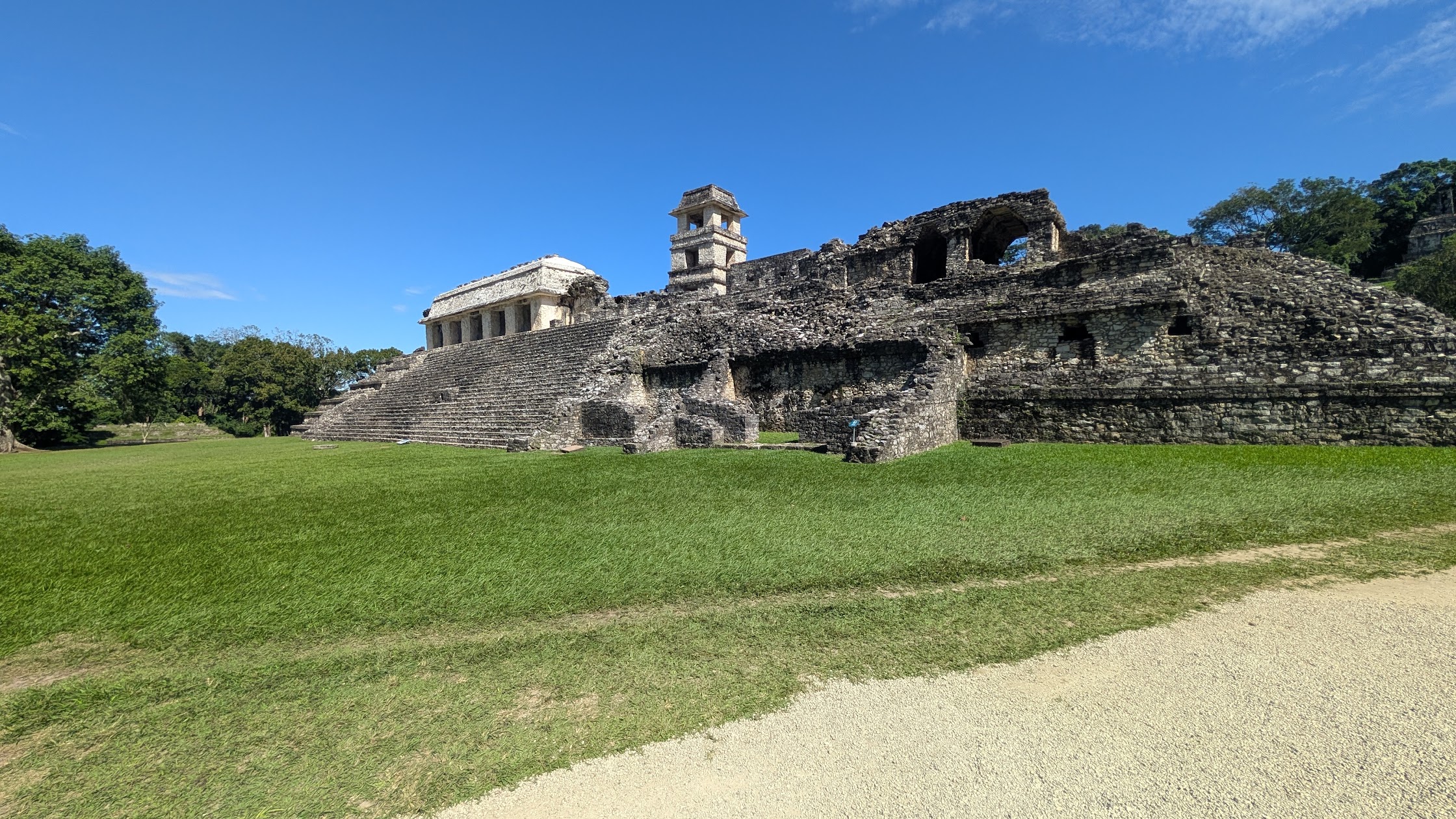 the three temples of the Cross complex at Palenque seen from the plaza