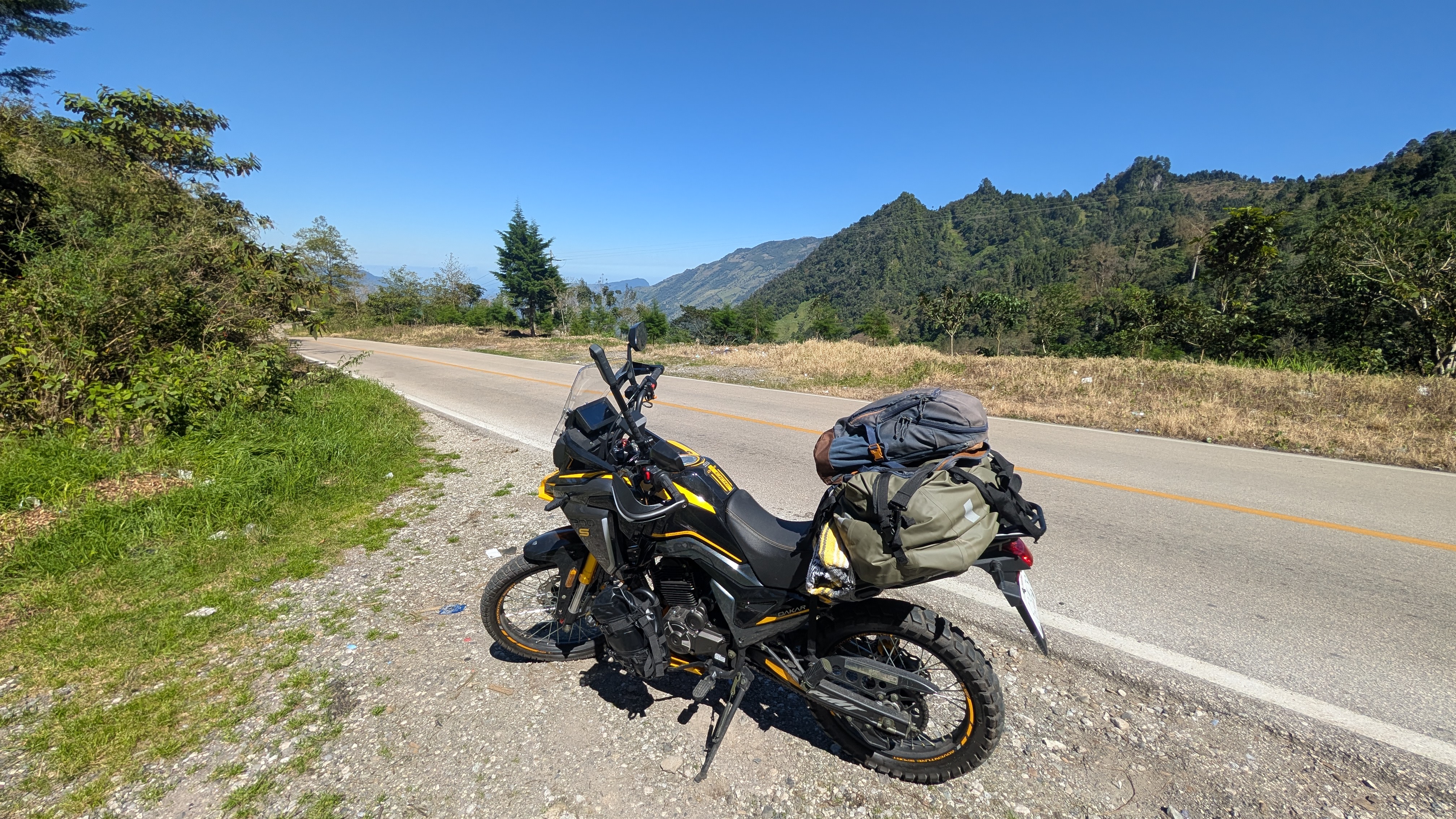 motorcycle parked on the side of the road in chiapas