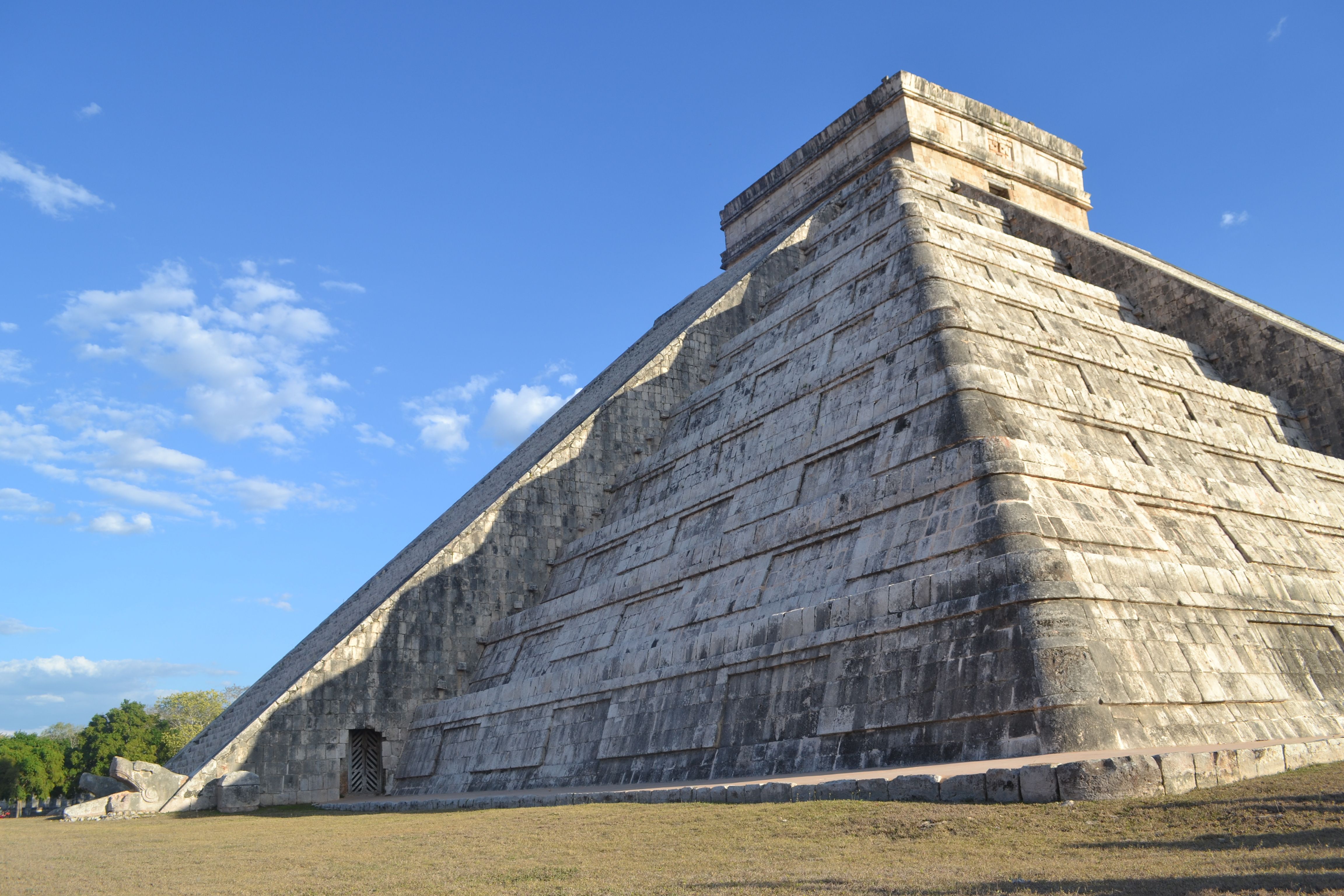 The diagonal light-and-shadow pattern falling across the northern staircase of El Castillo during the equinox