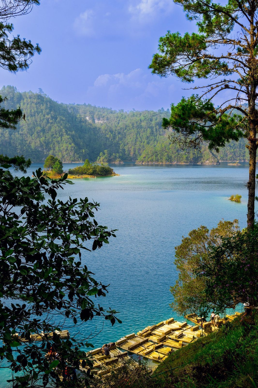 Wooden balsa raft dock on the turquoise waters of Lagos de Montebello, Chiapas, Mexico