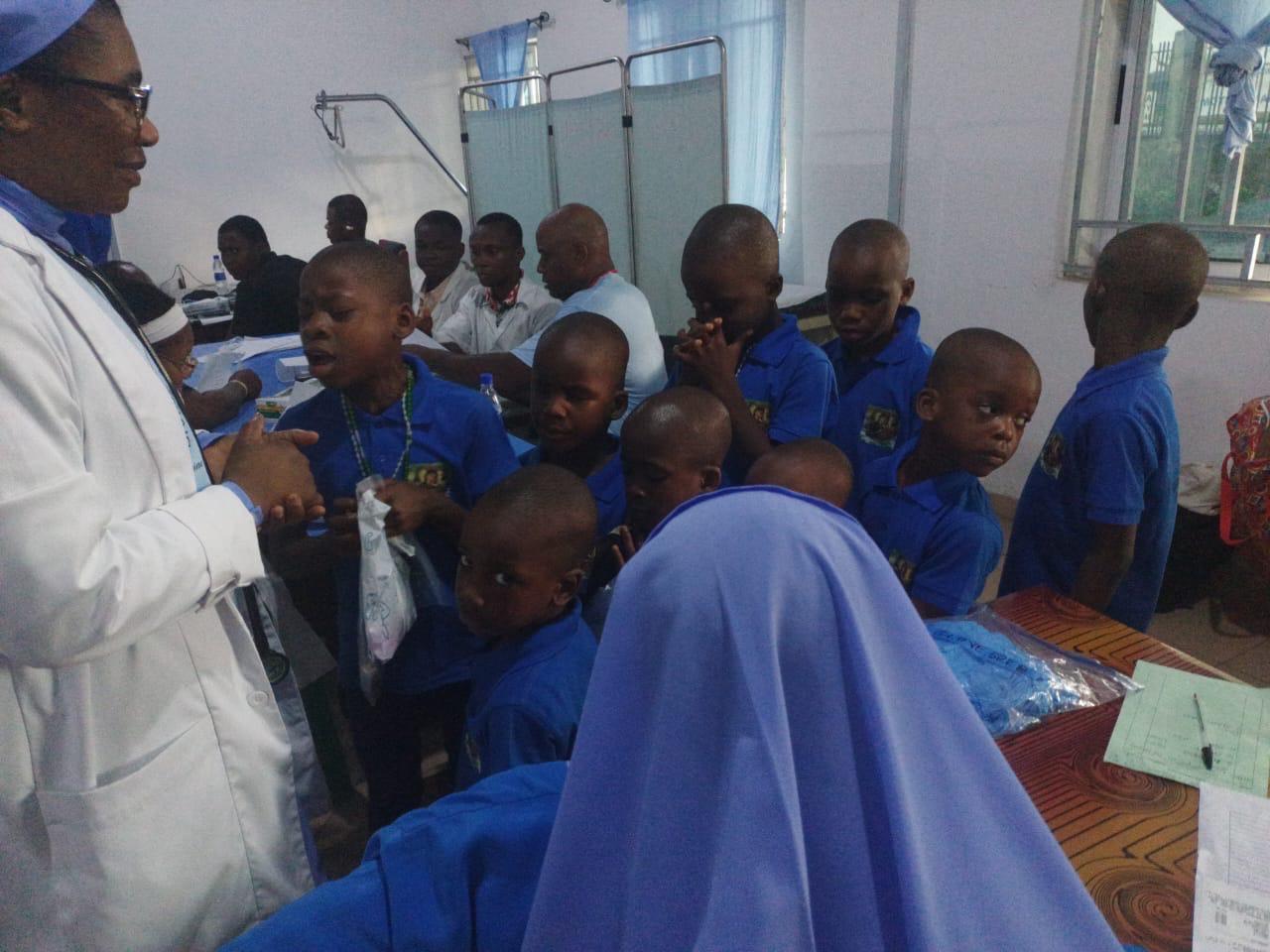 Children receiving compassion in action