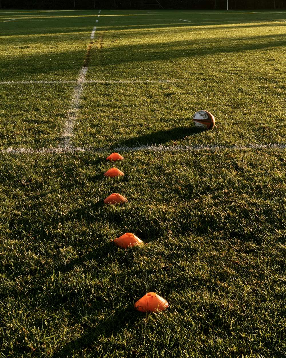 Rebels players on the pitch at practice