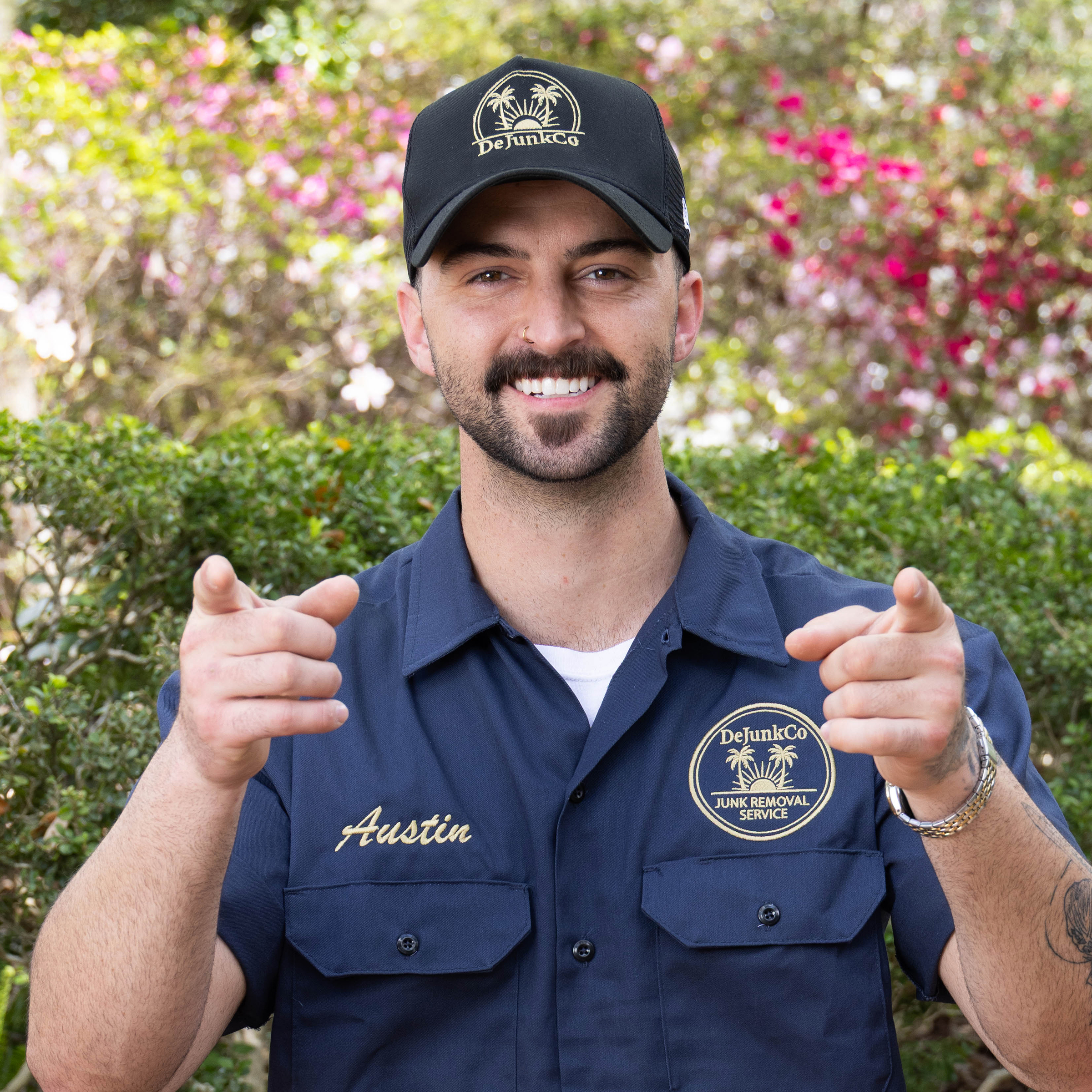 Austin of DeJunkCo in professional DeJunkCo uniform