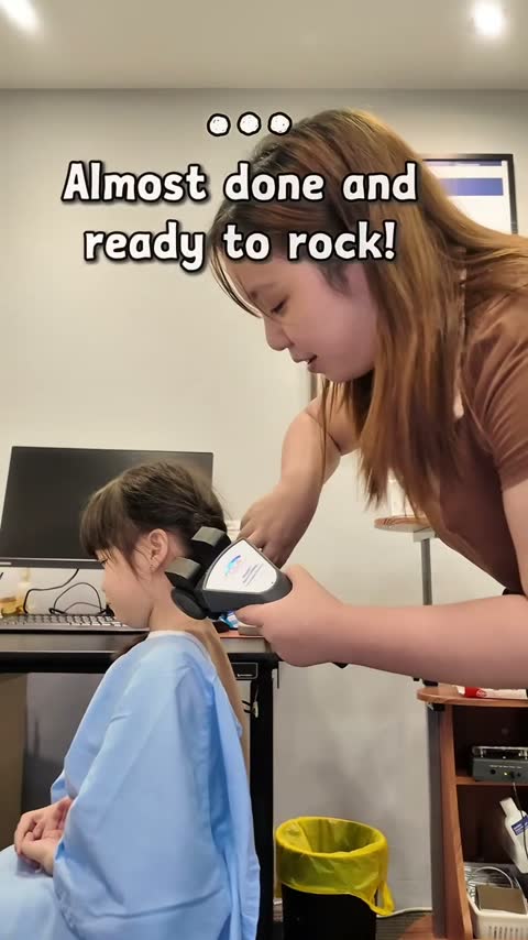 Physical assessment continuing along the child's spine
