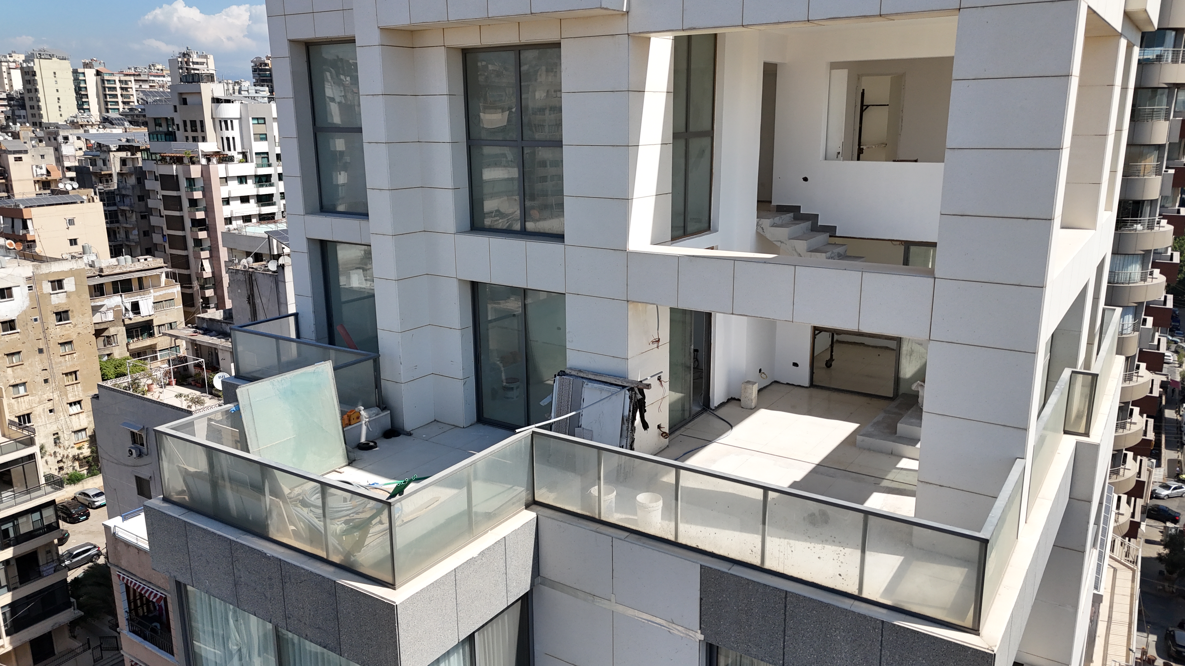 Olivia Residence facade and glass balconies in Beirut, photographed from above