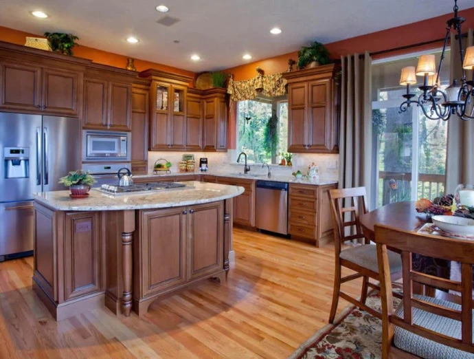 Traditional kitchen remodel with classic wooden cabinetry, warm tones, and timeless design in Elmsford NY.