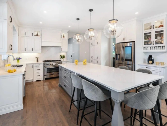 Kitchen island addition with seating, storage, and additional countertop space in a modern kitchen in Elmsford NY.