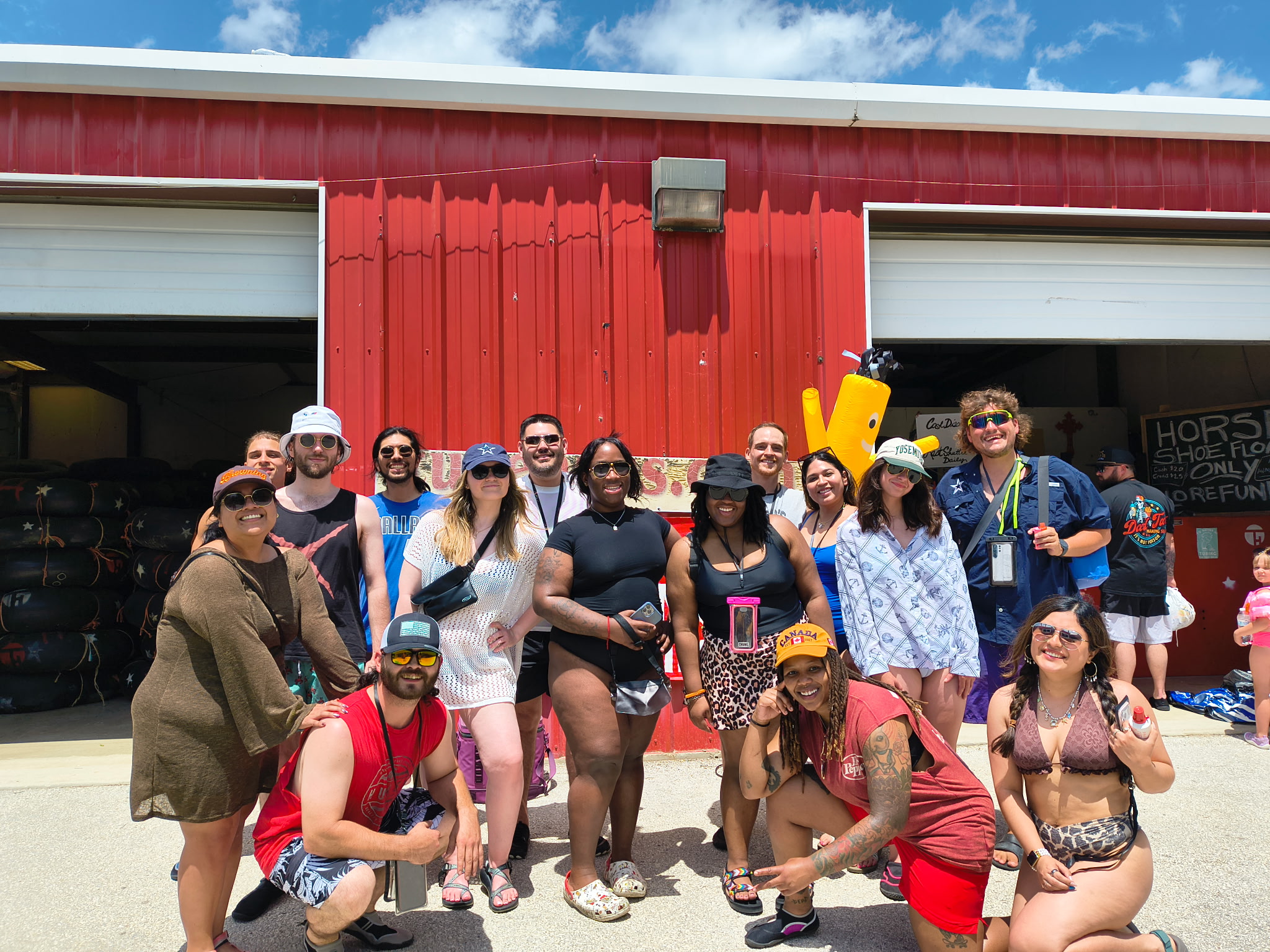 Large group of friends gathering at Tube Haus before a BYOB river tubing trip near Canyon Lake, Texas.