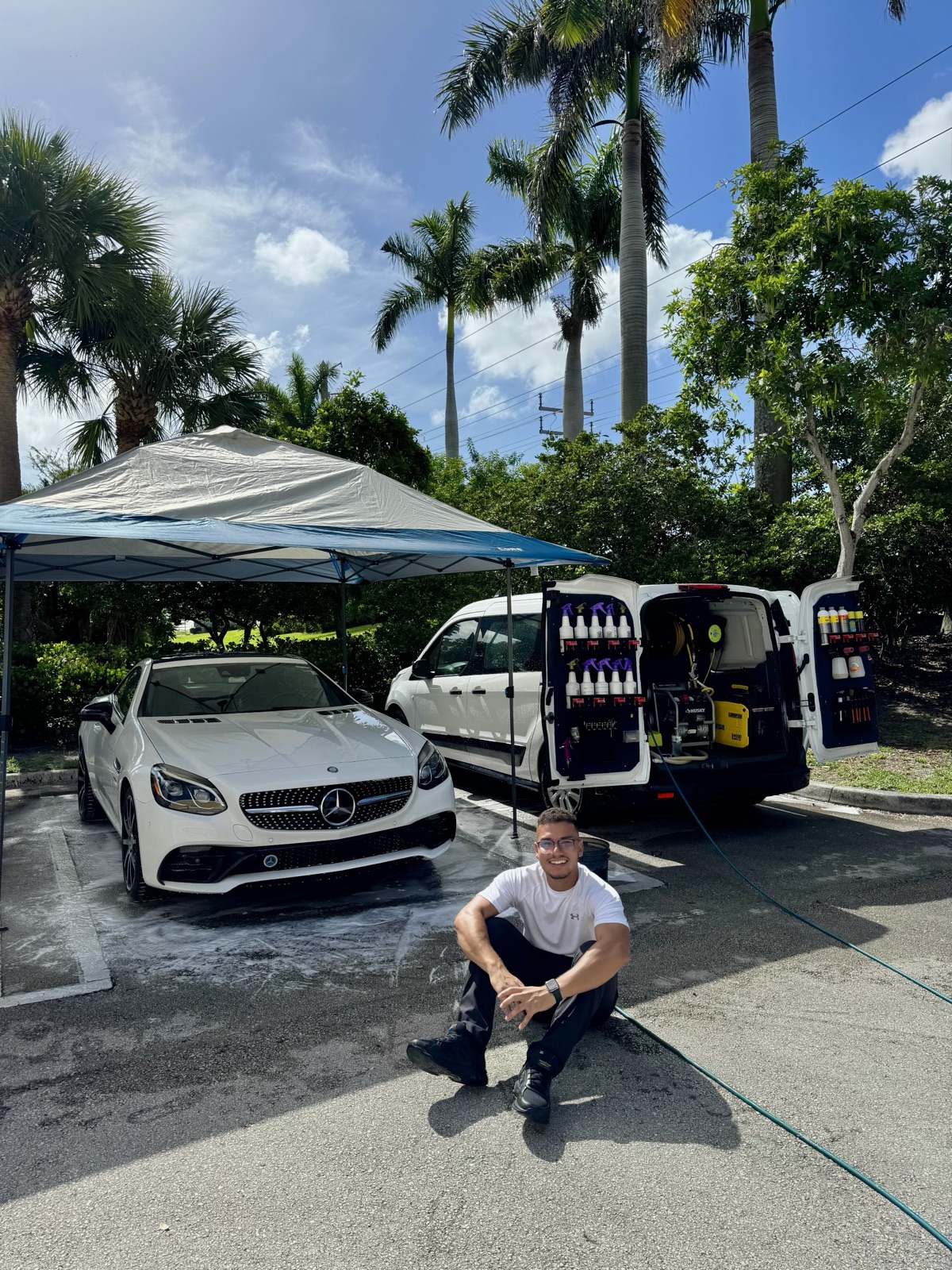 Creative Mobile Detailing team with a Mercedes and service van