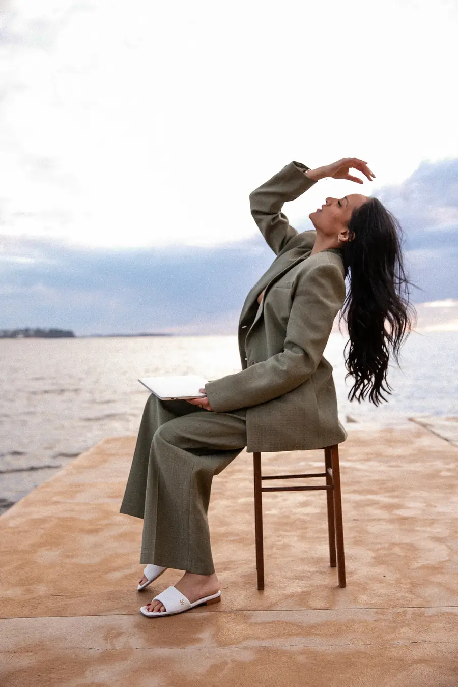 Saddy on the jetty, hand in her hair
