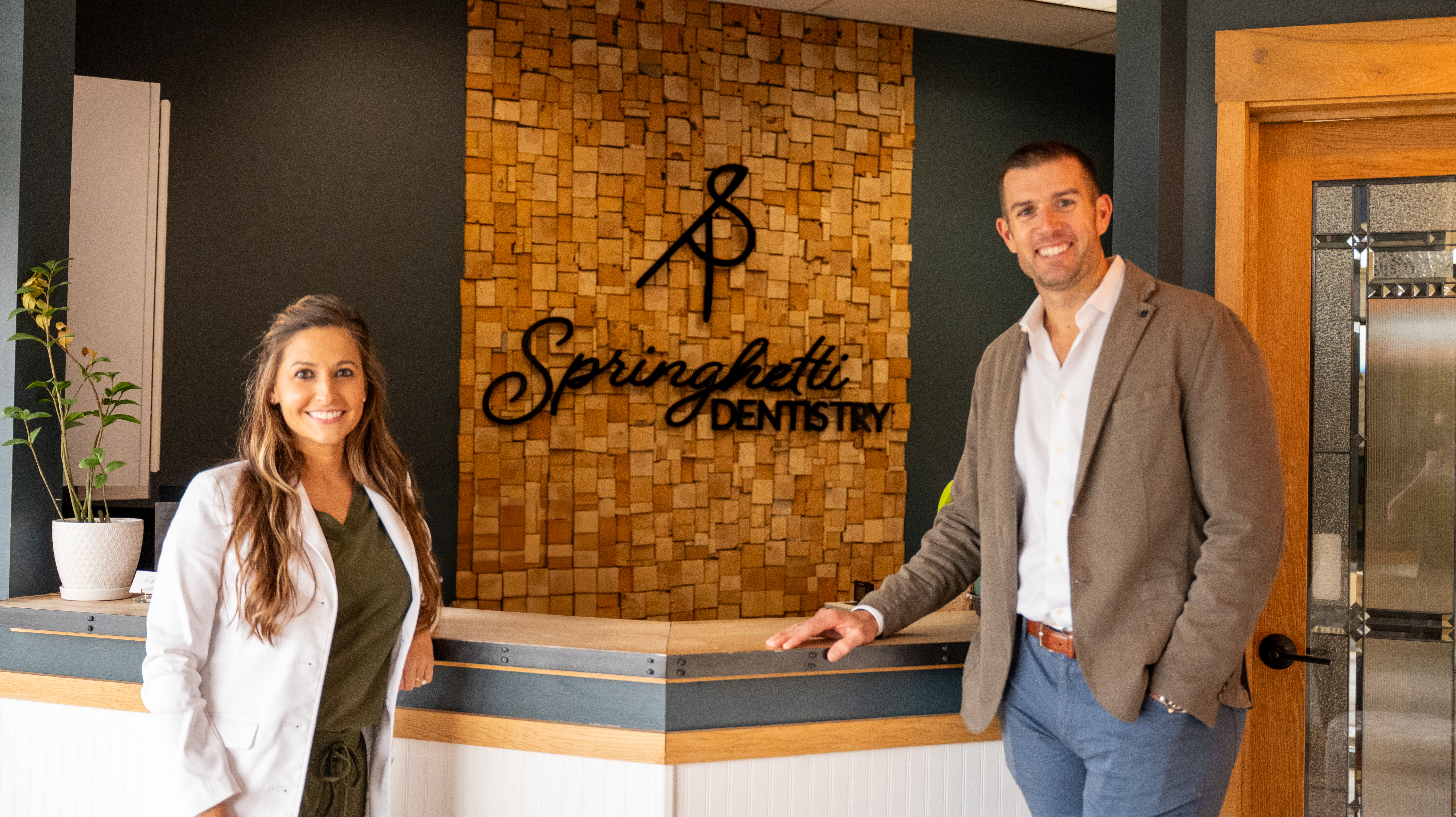Dr. Springhetti and team at the Springhetti Dentistry front desk