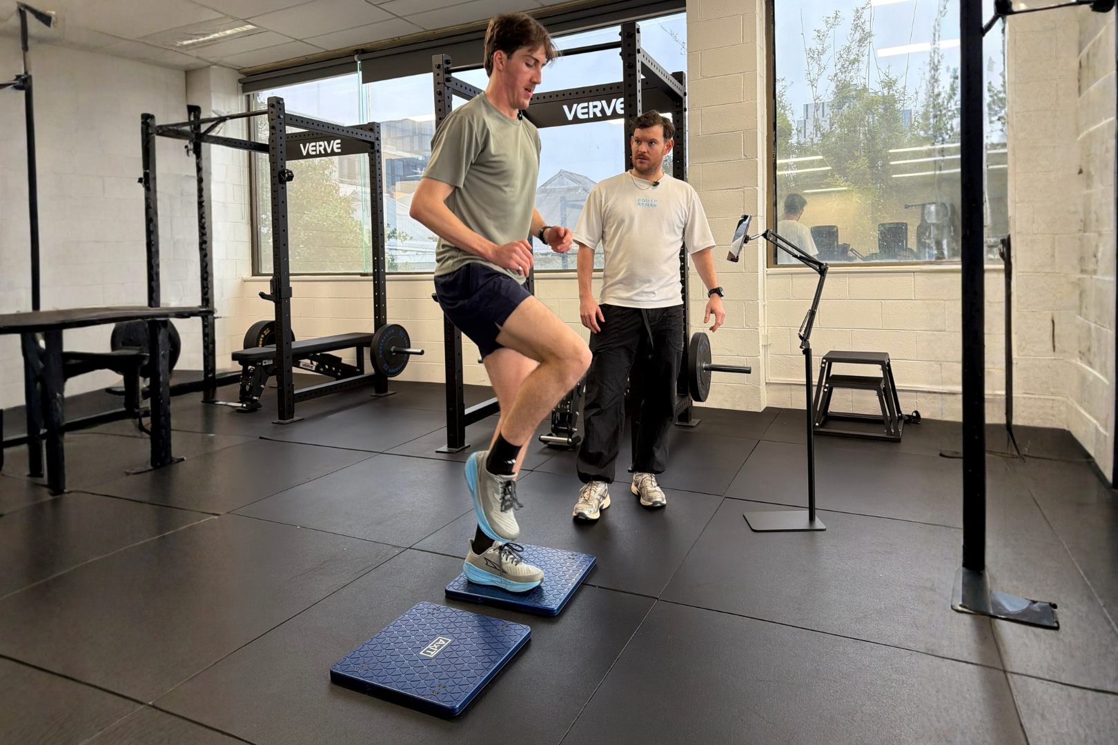 Clinician assessing strength and movement as part of objective testing
