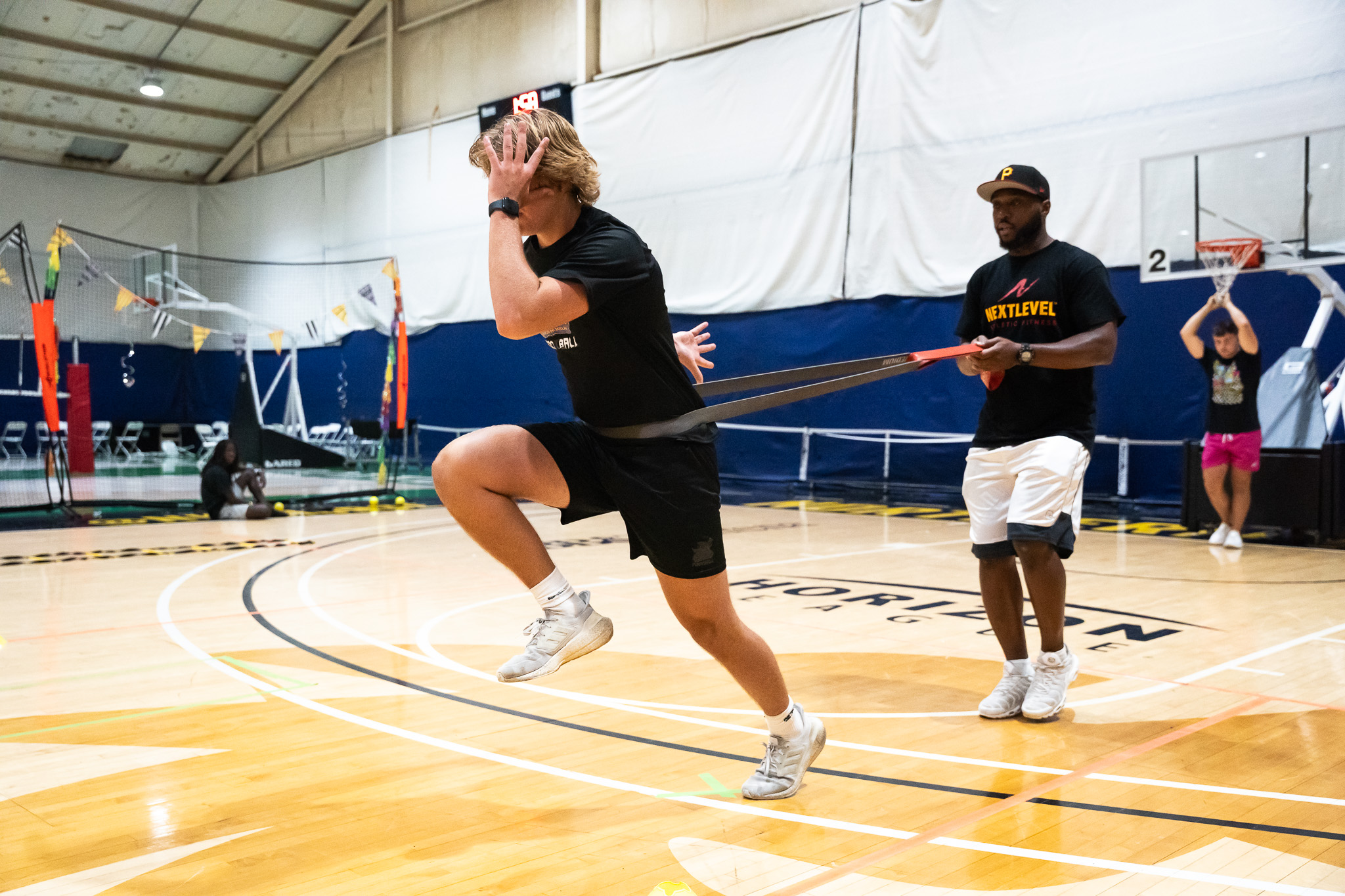 Antonio Williams training an athlete at Next Level Athletic Fitness