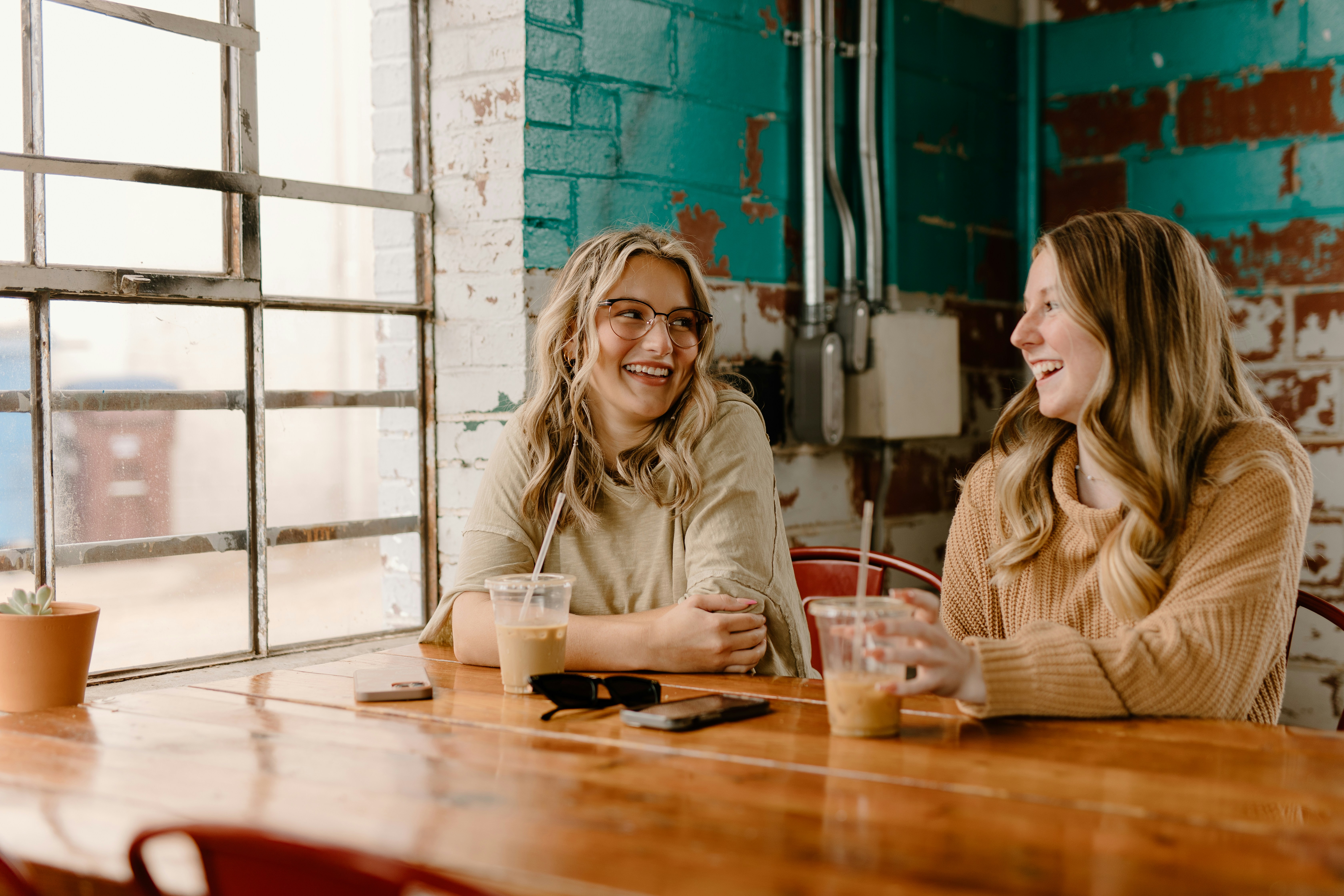 women talking and laughing women talking and laughing