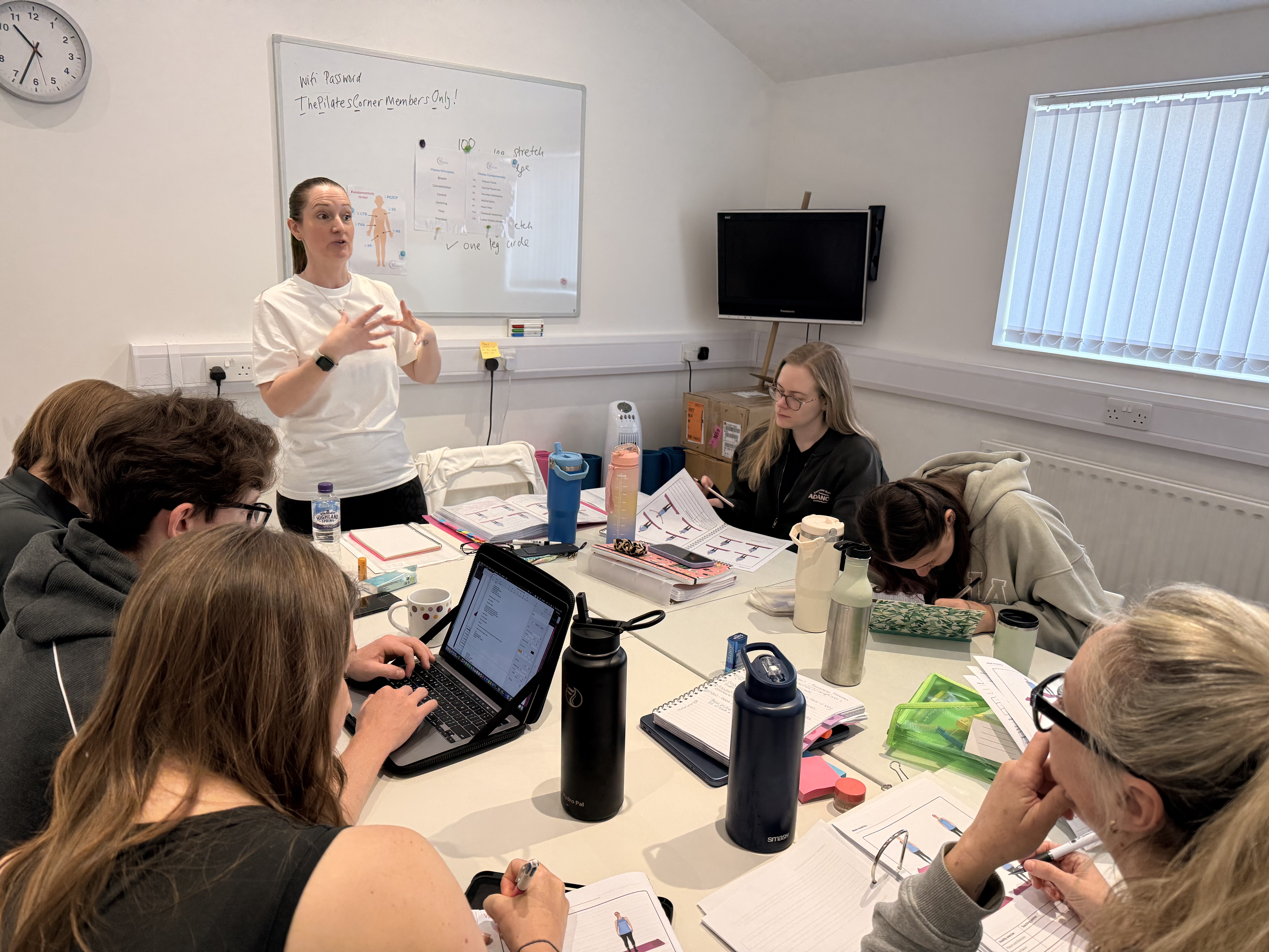 Emma Lovelock presenting to students at The Hertfordshire School of Pilates Beginners Workshop