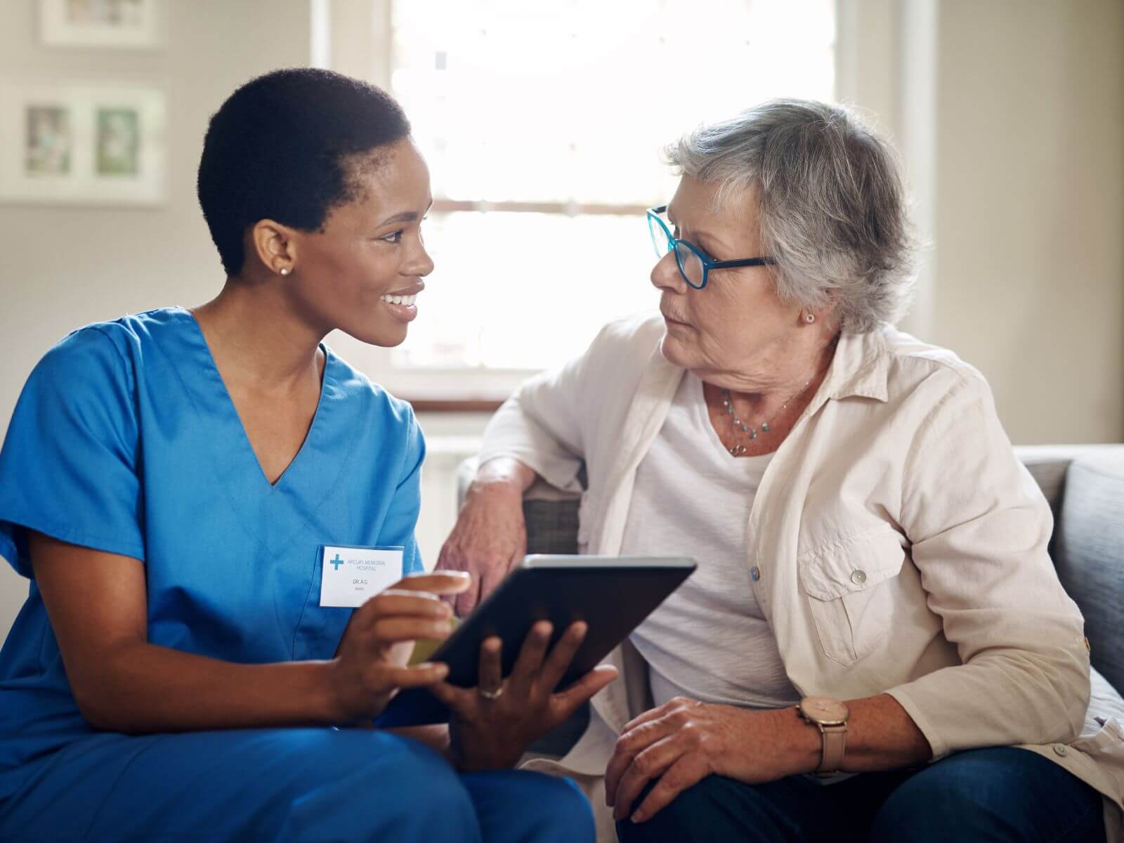Caregiver assisting the senior woman