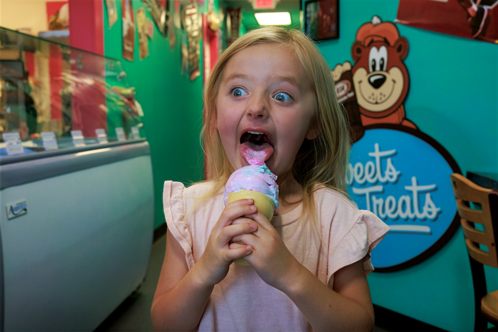 Excited little girl at Retro Deli