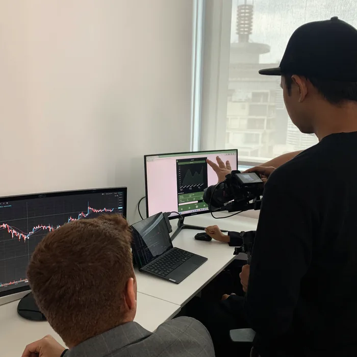 Production team working at the monitors during a shoot