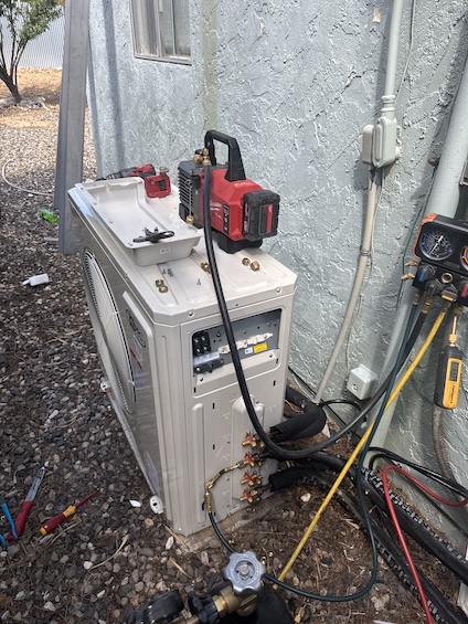 Heat pump commissioning with vacuum pump and gauges by Rush HVAC Services in the East Valley, AZ