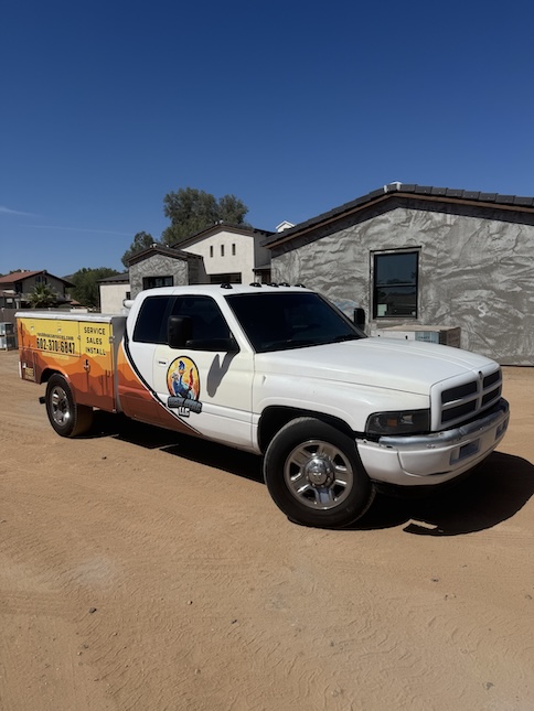 Rush HVAC Services truck parked outside a newly built home in Queen Creek, AZ
