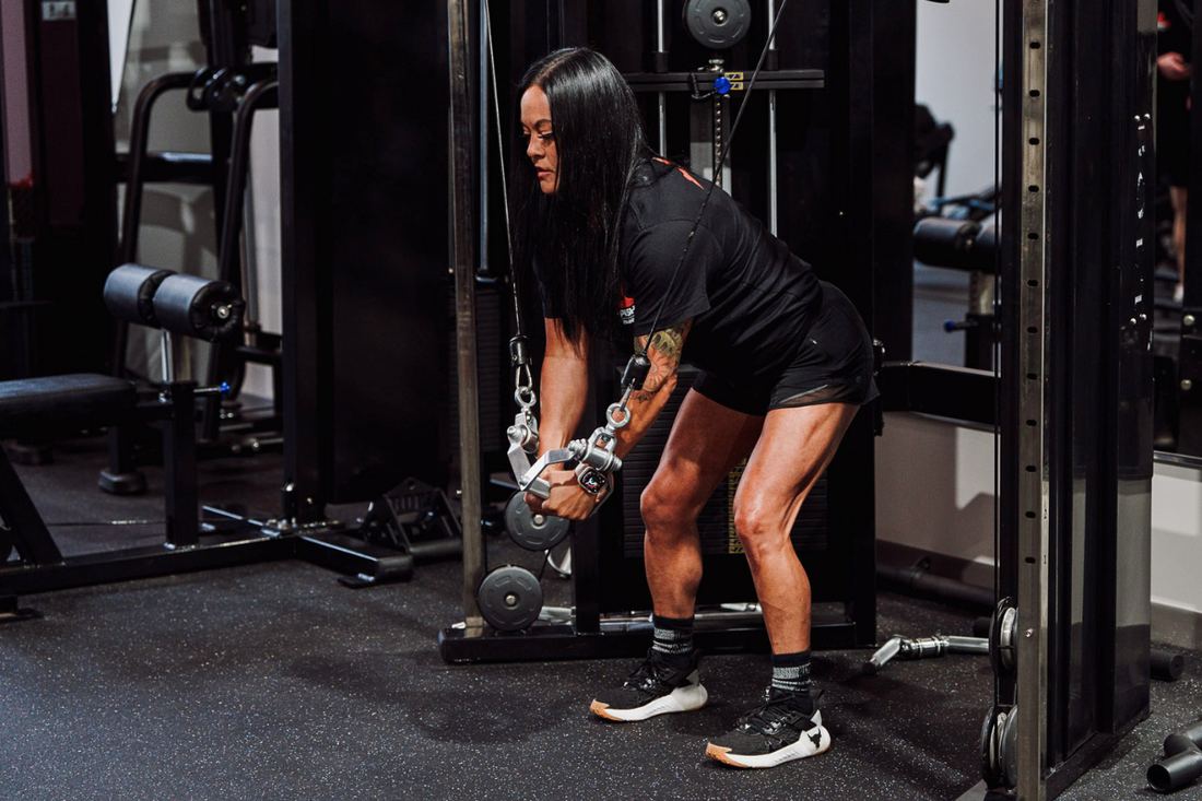 Member training on the cable machine at Push Performance Training in Bixby