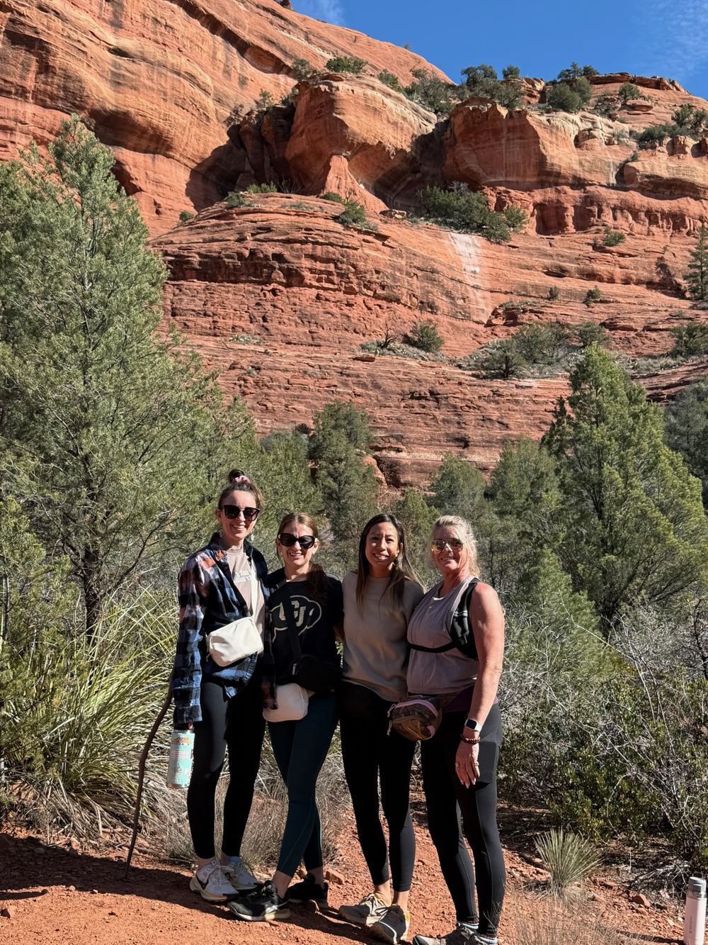 Women hiking Sedona red rocks