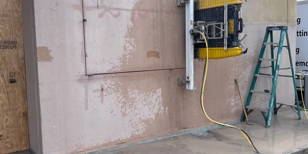 Professional concrete cutting and coring equipment on job site