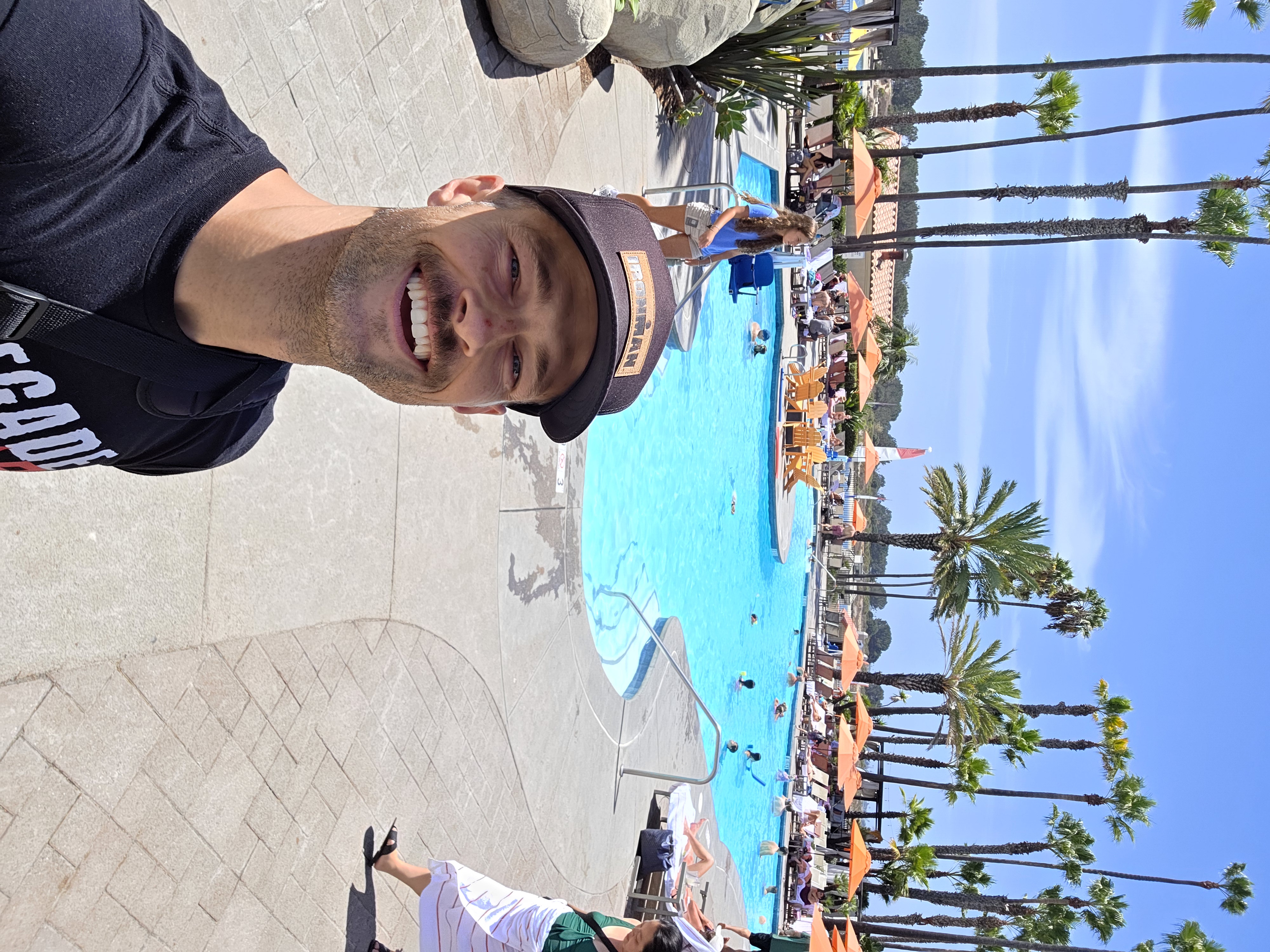 Matt at the pool area of San Diego Mission Bay Resort, overlooking the waterfront