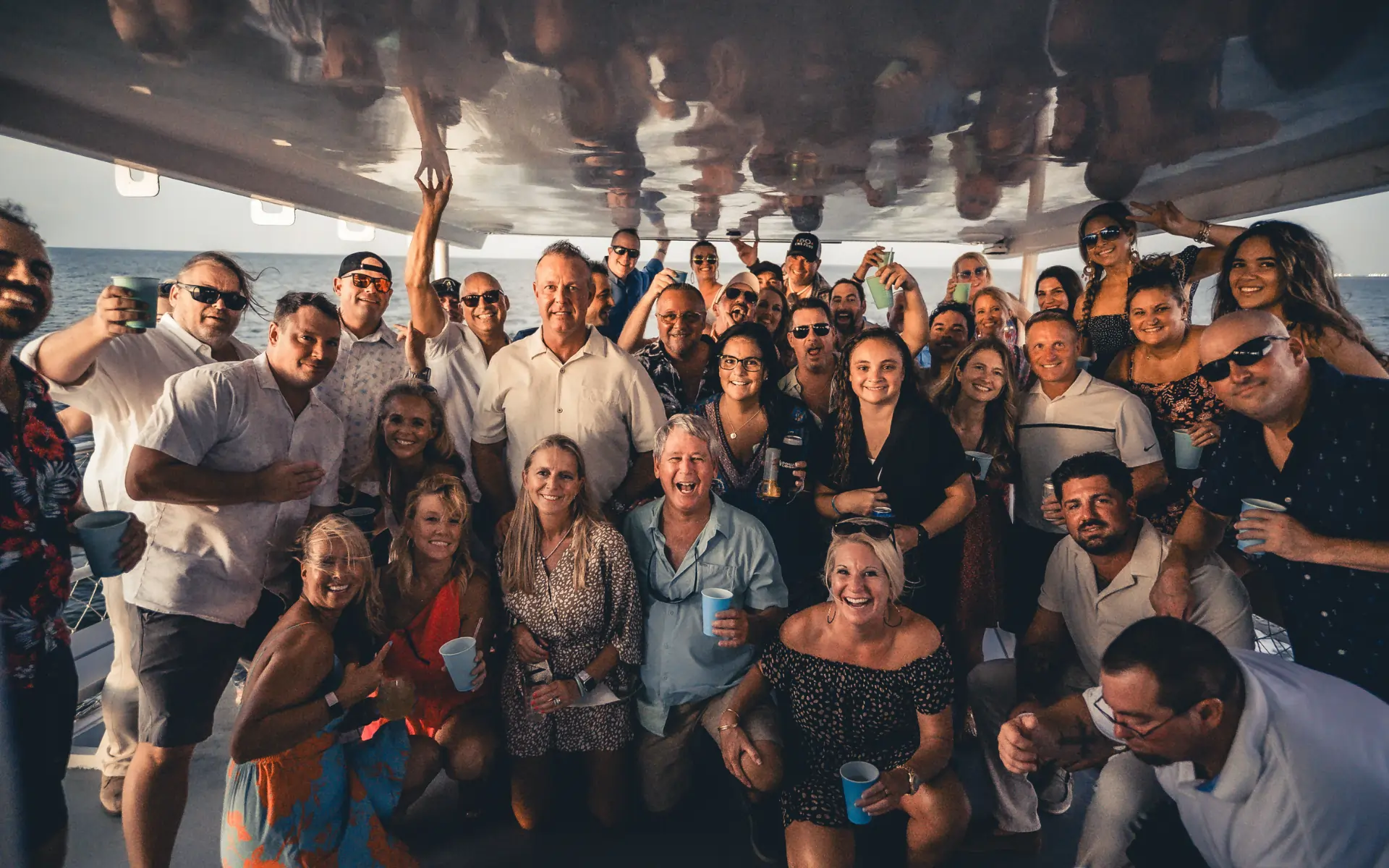 Private Birthday party guests taking a picture on The Pelican St Pete boat cruise