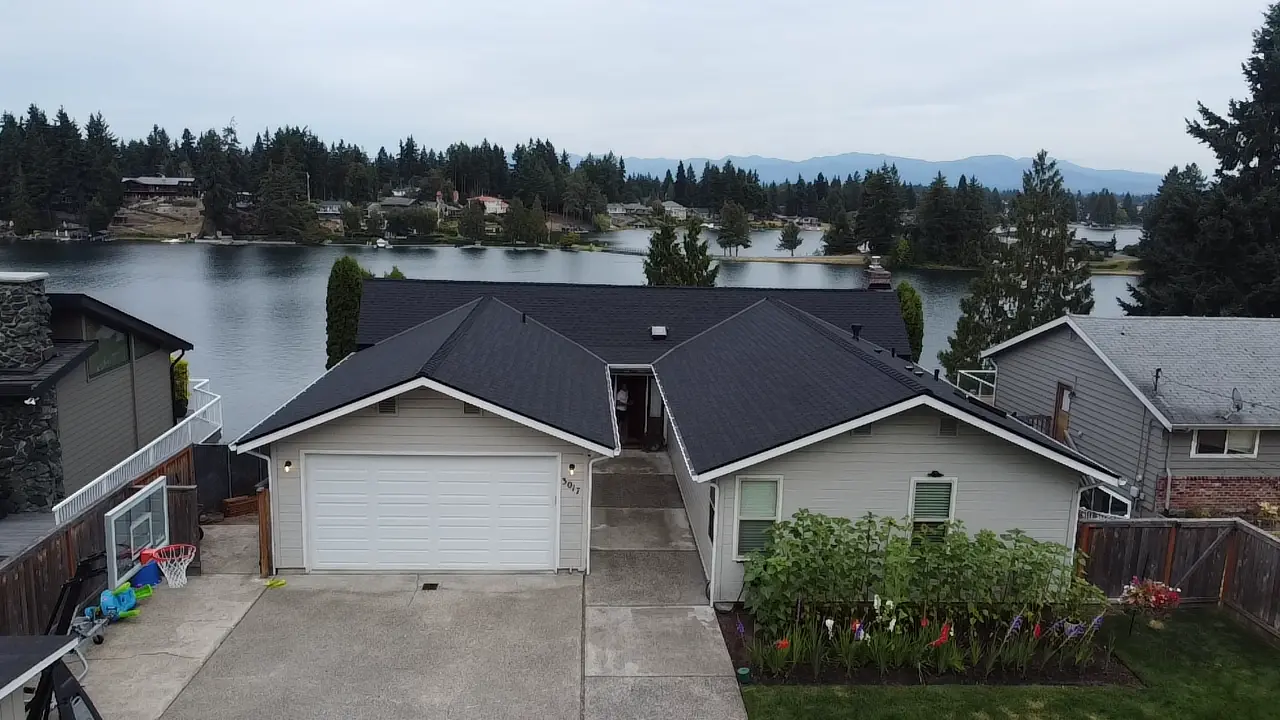 Roosevelt Roofing contractor repairing flashing on a Pierce County WA home Roosevelt Roofing contractor repairing flashing on a Pierce County WA home