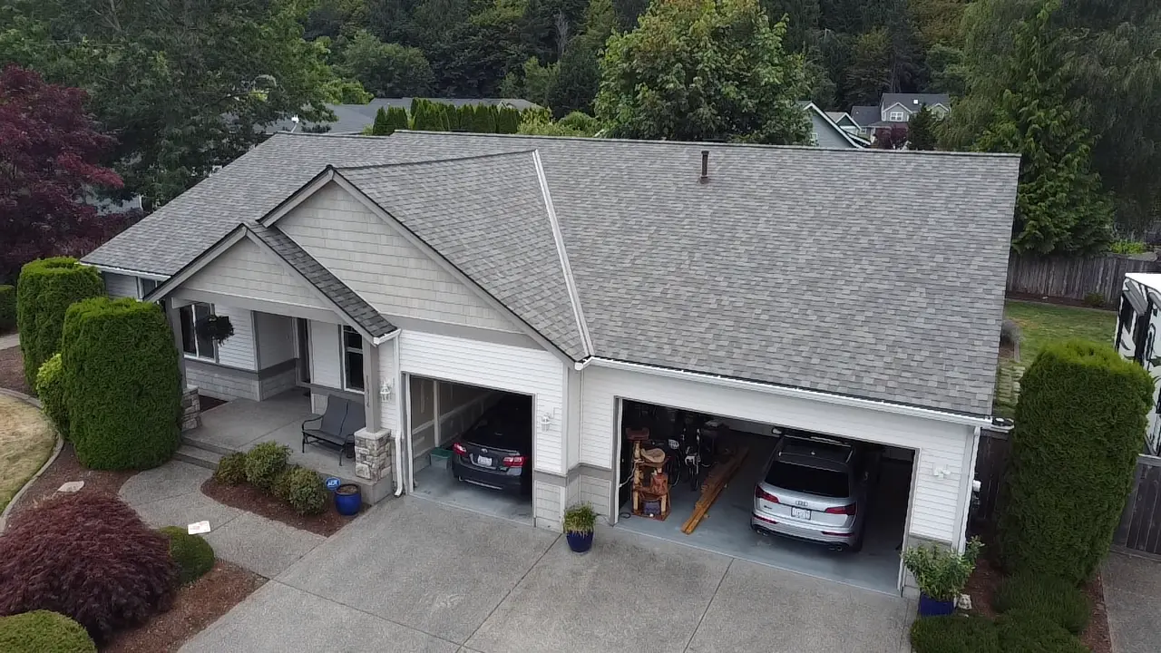 Roosevelt Roofing contractor repairing flashing on a Pierce County WA home Roosevelt Roofing contractor repairing flashing on a Pierce County WA home