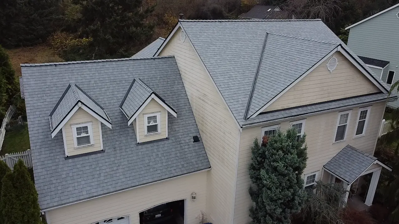Roosevelt Roofing contractor completing residential shingle repair on a Pierce County WA home