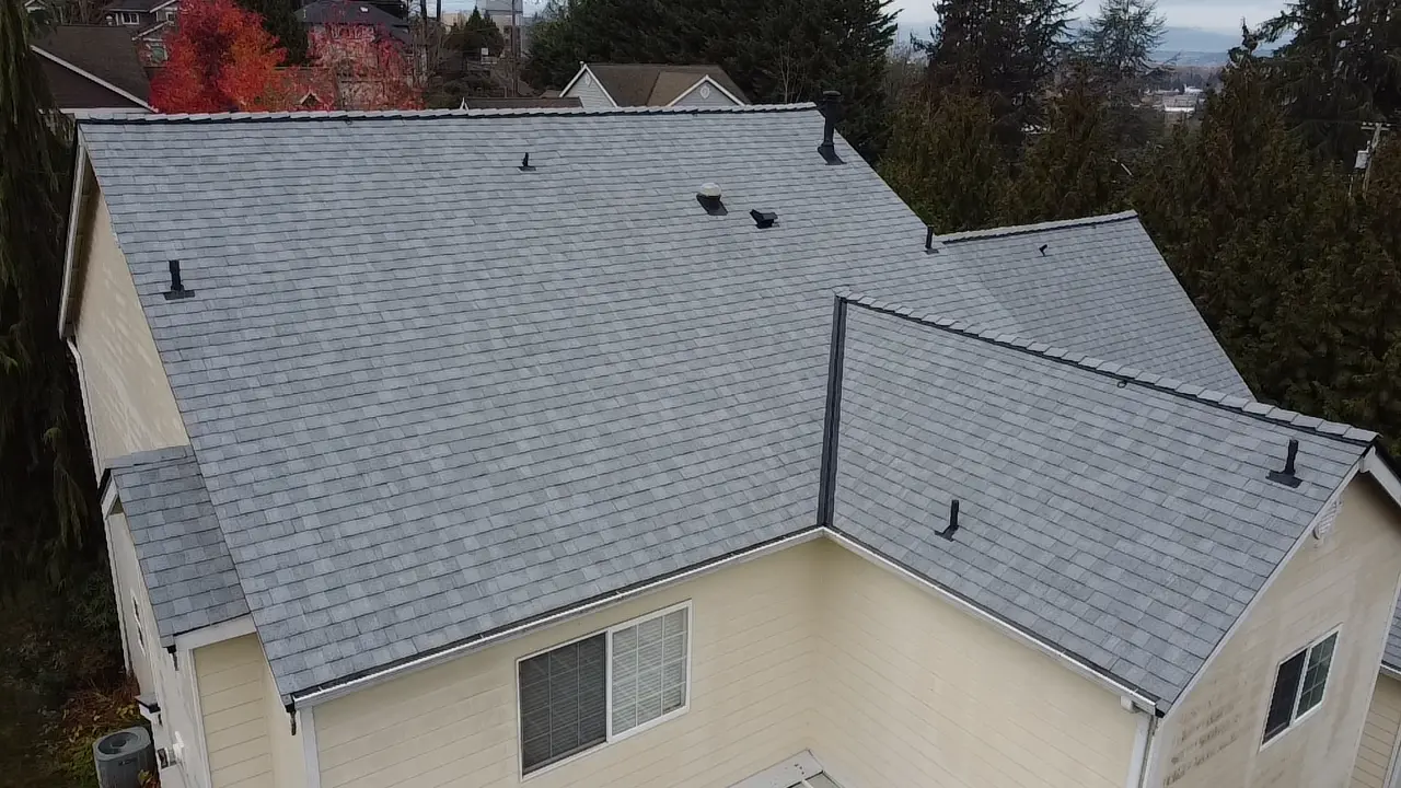 Roosevelt Roofing contractor completing residential shingle repair on a Pierce County WA home