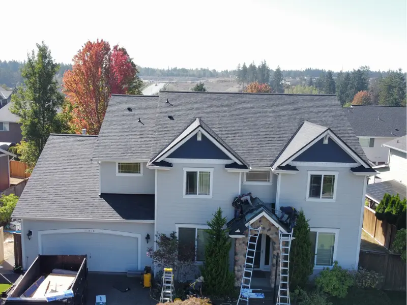 Roosevelt Roofing LLC owner Eric Haugh inspecting a residential roof in Pierce County WA Roosevelt Roofing LLC owner Eric Haugh inspecting a residential roof in Pierce County WA