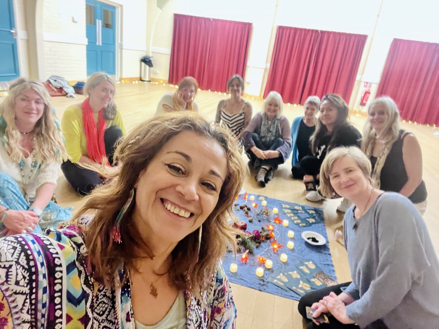 Farah and guests gathered together in a circle