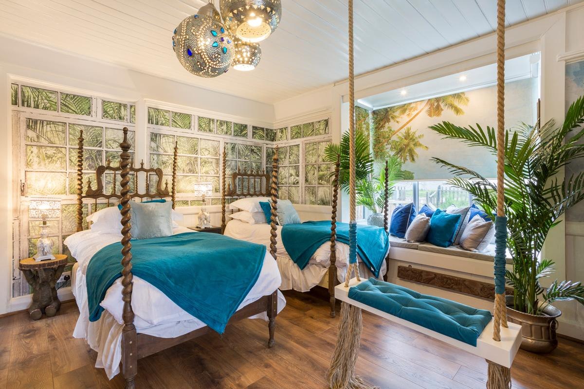 Pondicherry suite with a hanging swing bed