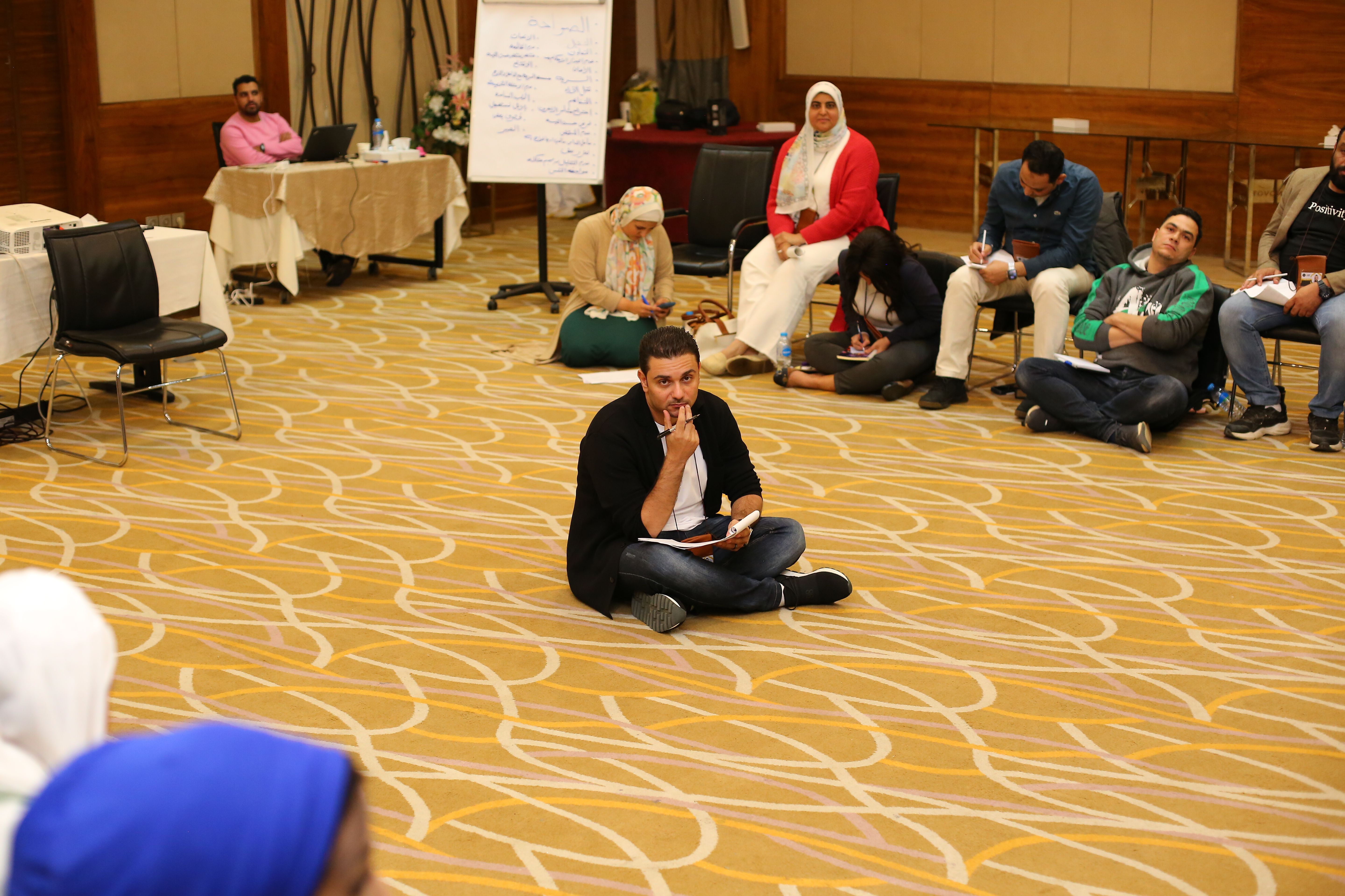 Ahmed Latif mentoring a participant during a PCC coaching session