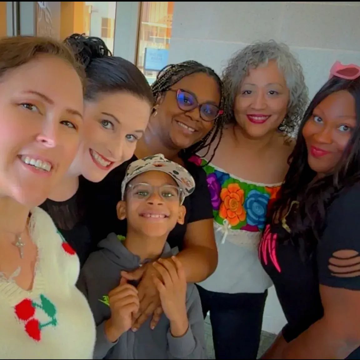 InspireHer sisters smiling together