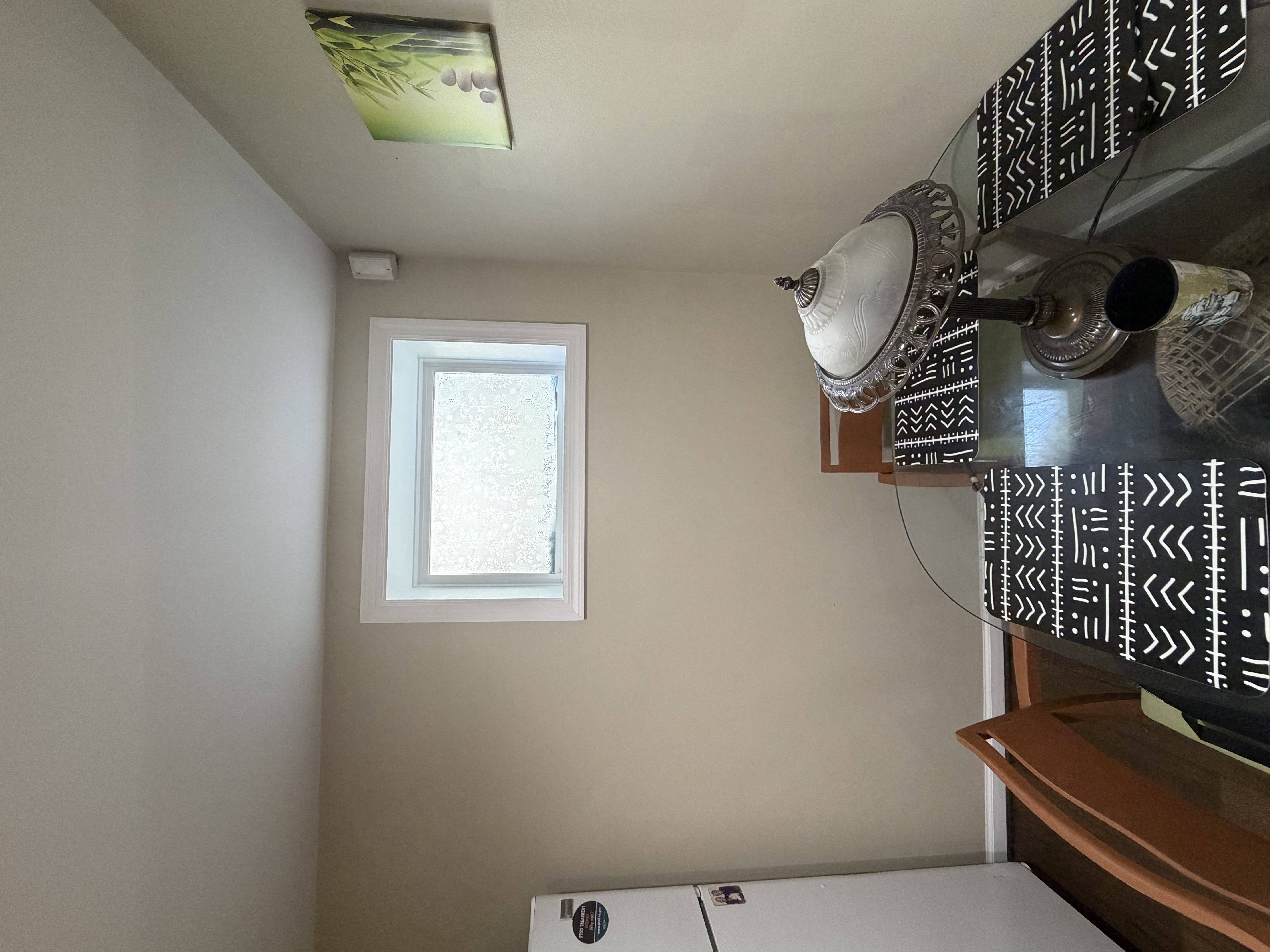 New larger basement window bringing natural light into the lower-level independent living space