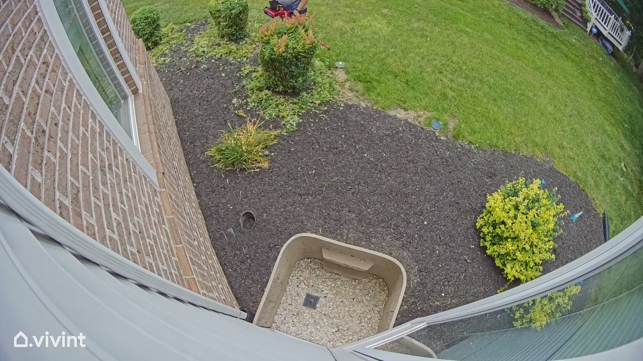 Exterior view of basement egress well providing an emergency safety route