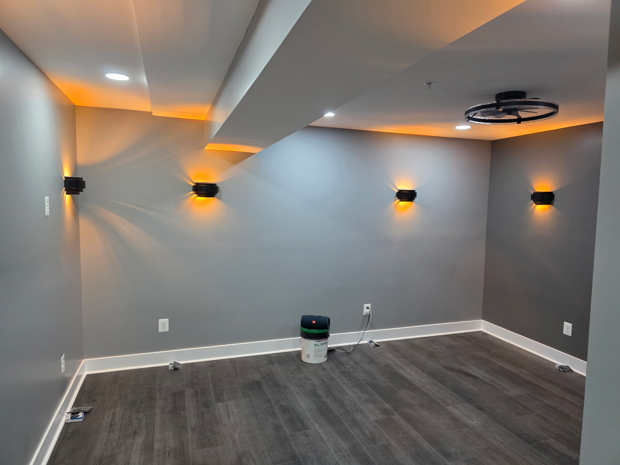 Layered Lighting in basement remodel by Andre Horne