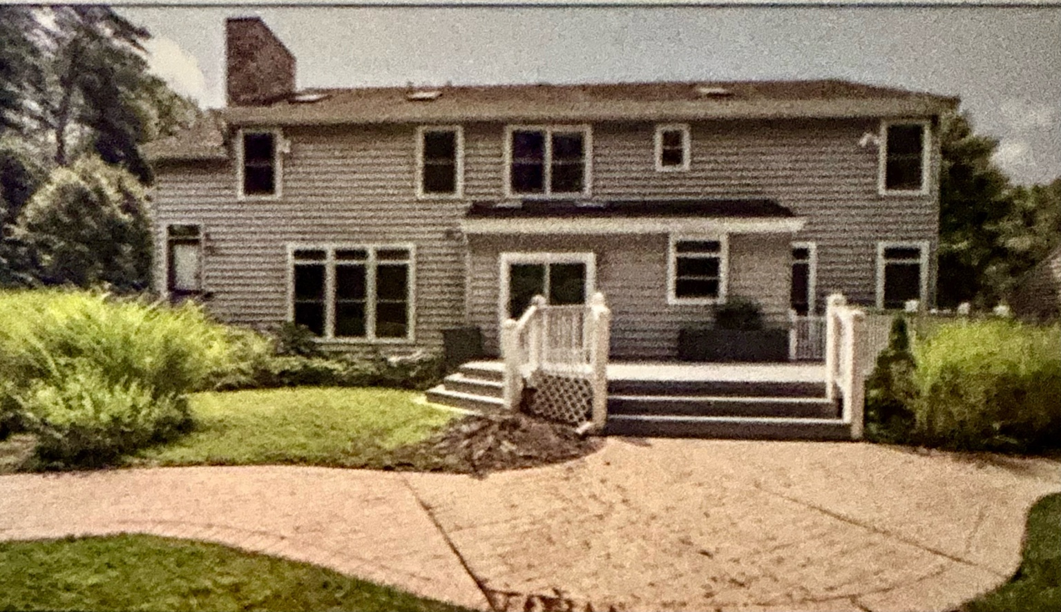 Backyard and original deck before Andre reinforced the structure and built the mother-in-law suite